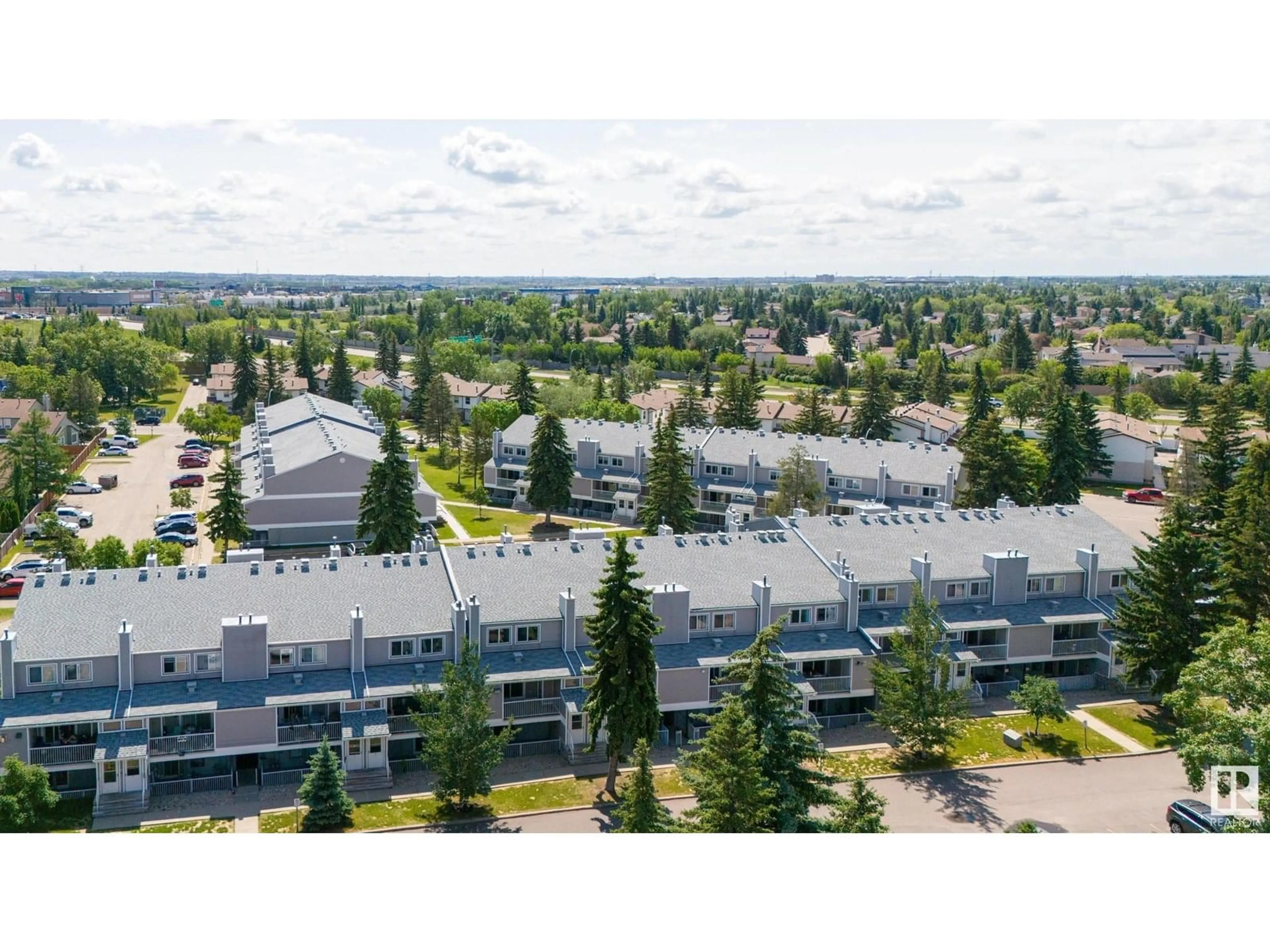 A pic from outside/outdoor area/front of a property/back of a property/a pic from drone, mountain view for 309 - 10404 24 AV, Edmonton Alberta T6J4J7