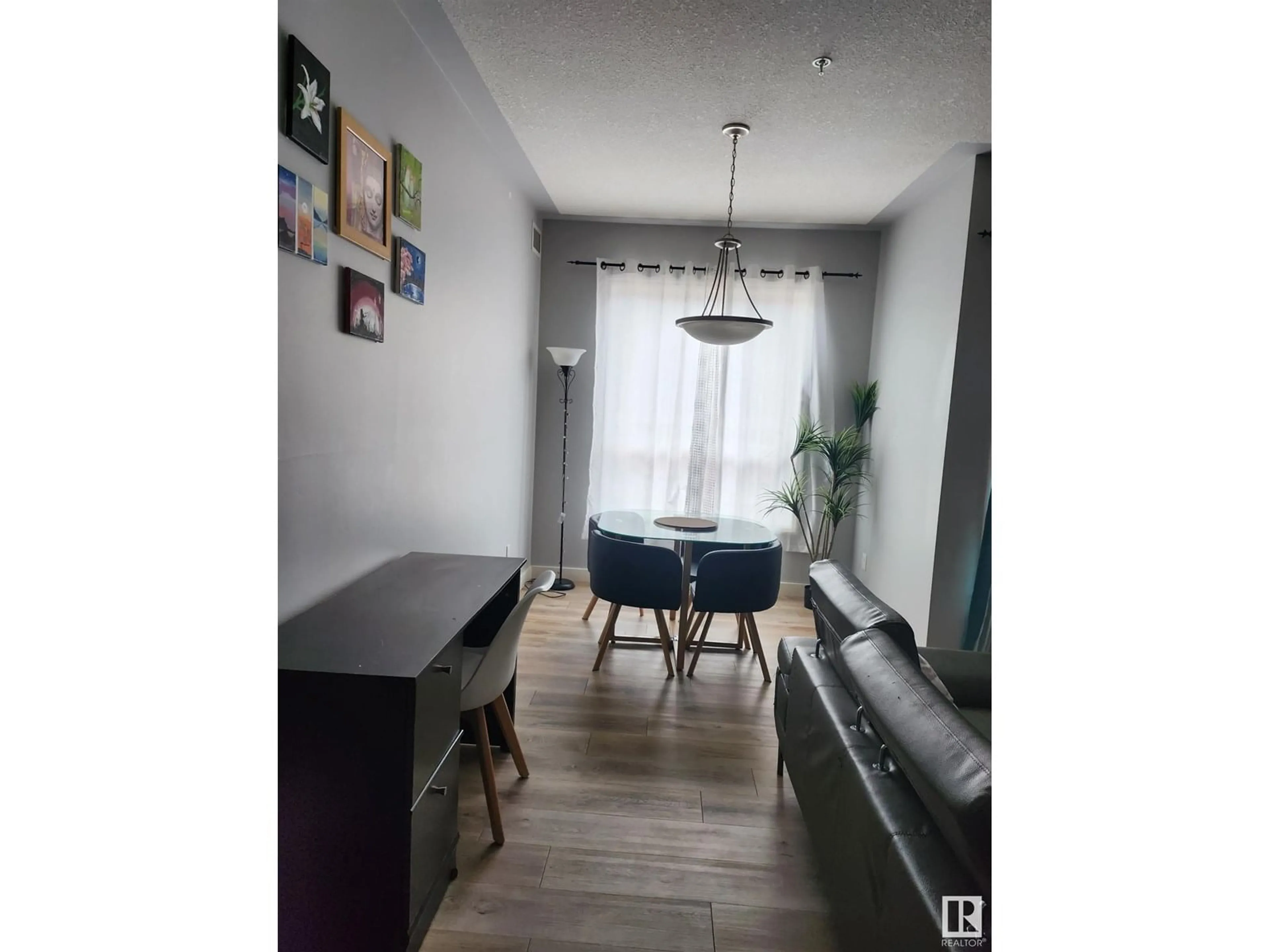 Dining room, wood/laminate floor for #206 - 10606 102 AV, Edmonton Alberta T5J5E9