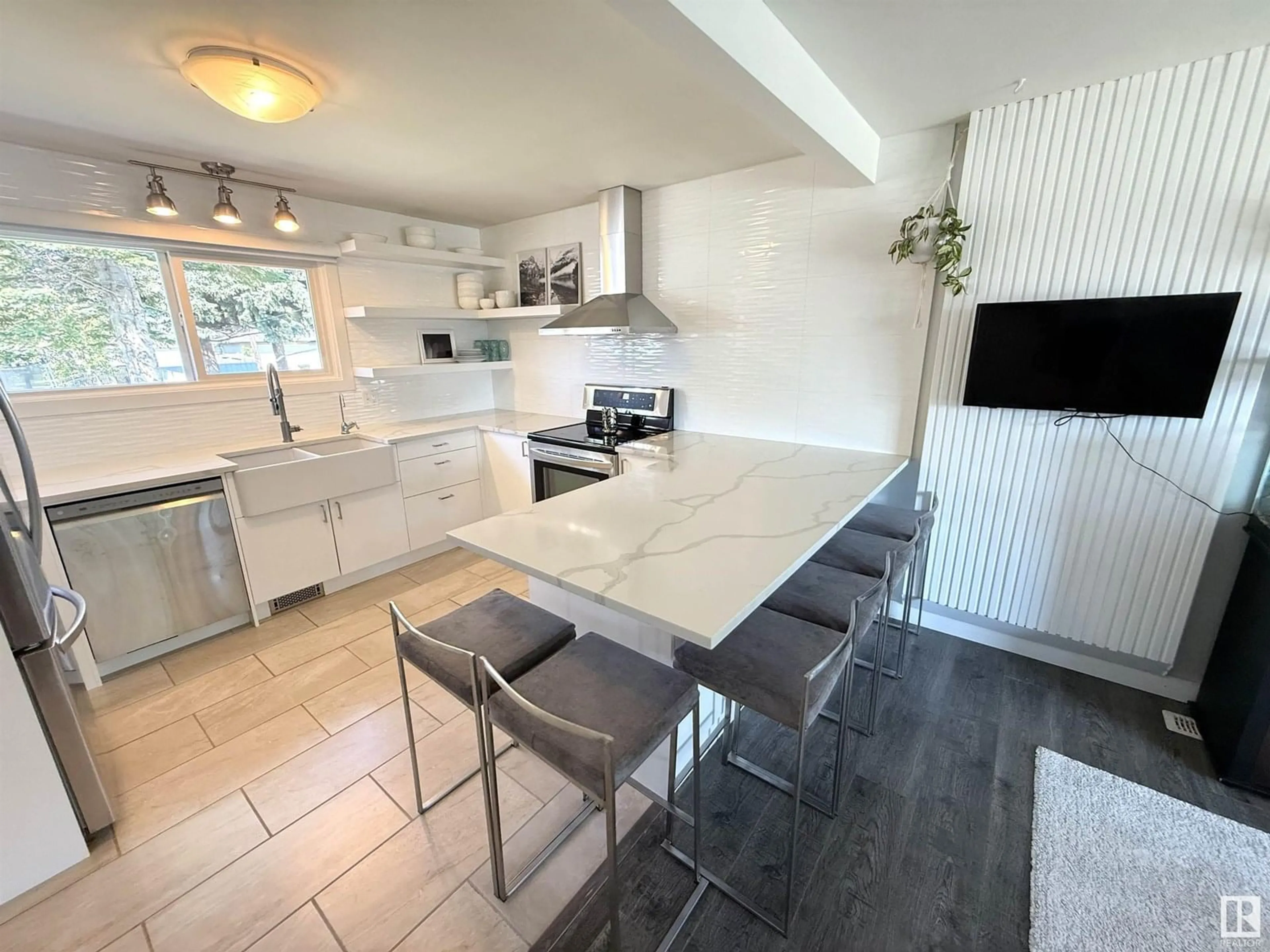 Open concept kitchen, ceramic/tile floor for 13312 103 ST, Edmonton Alberta T5E4M5