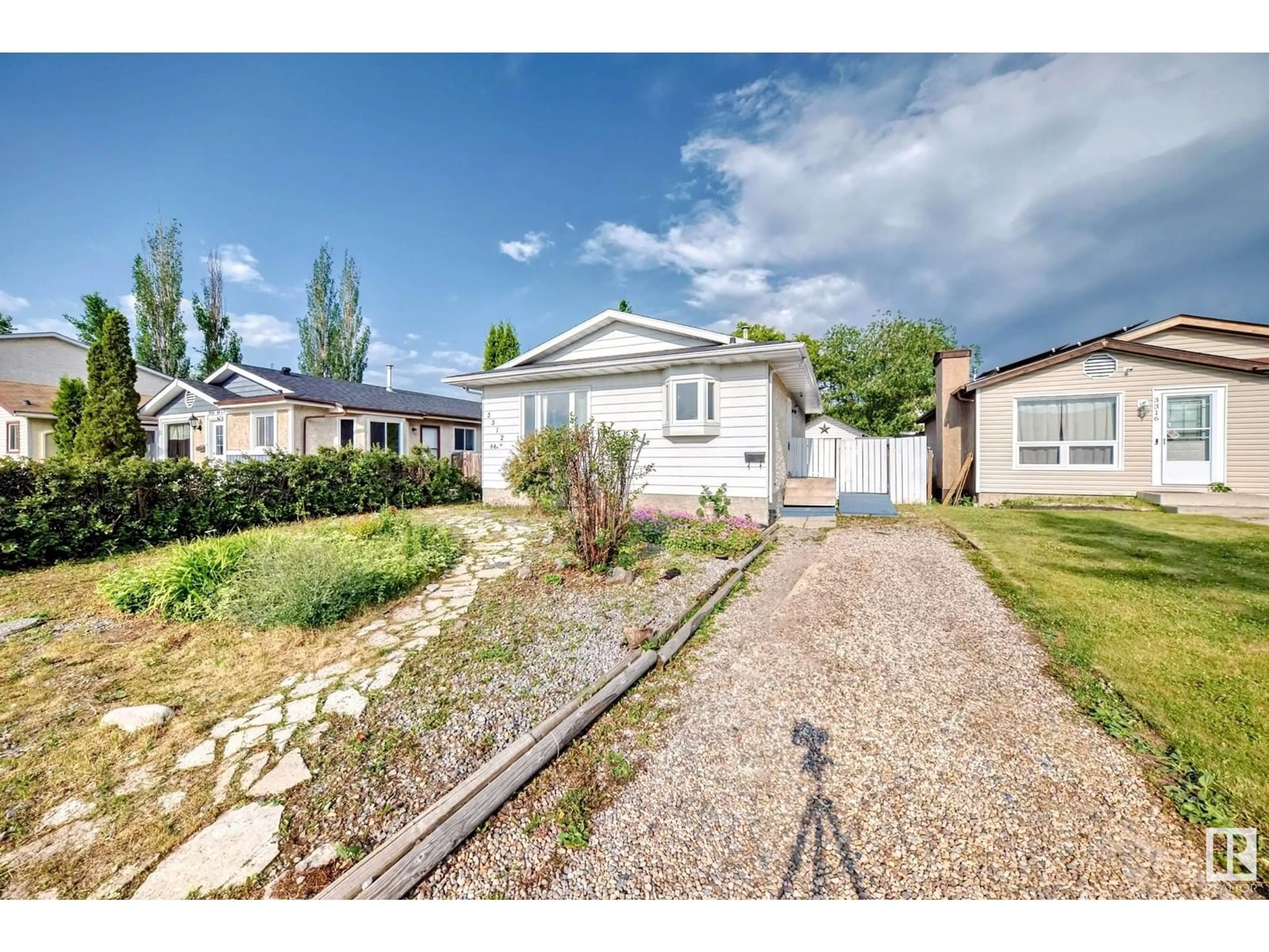 A pic from outside/outdoor area/front of a property/back of a property/a pic from drone, street for 3312 44A ST, Edmonton Alberta T6L4W9