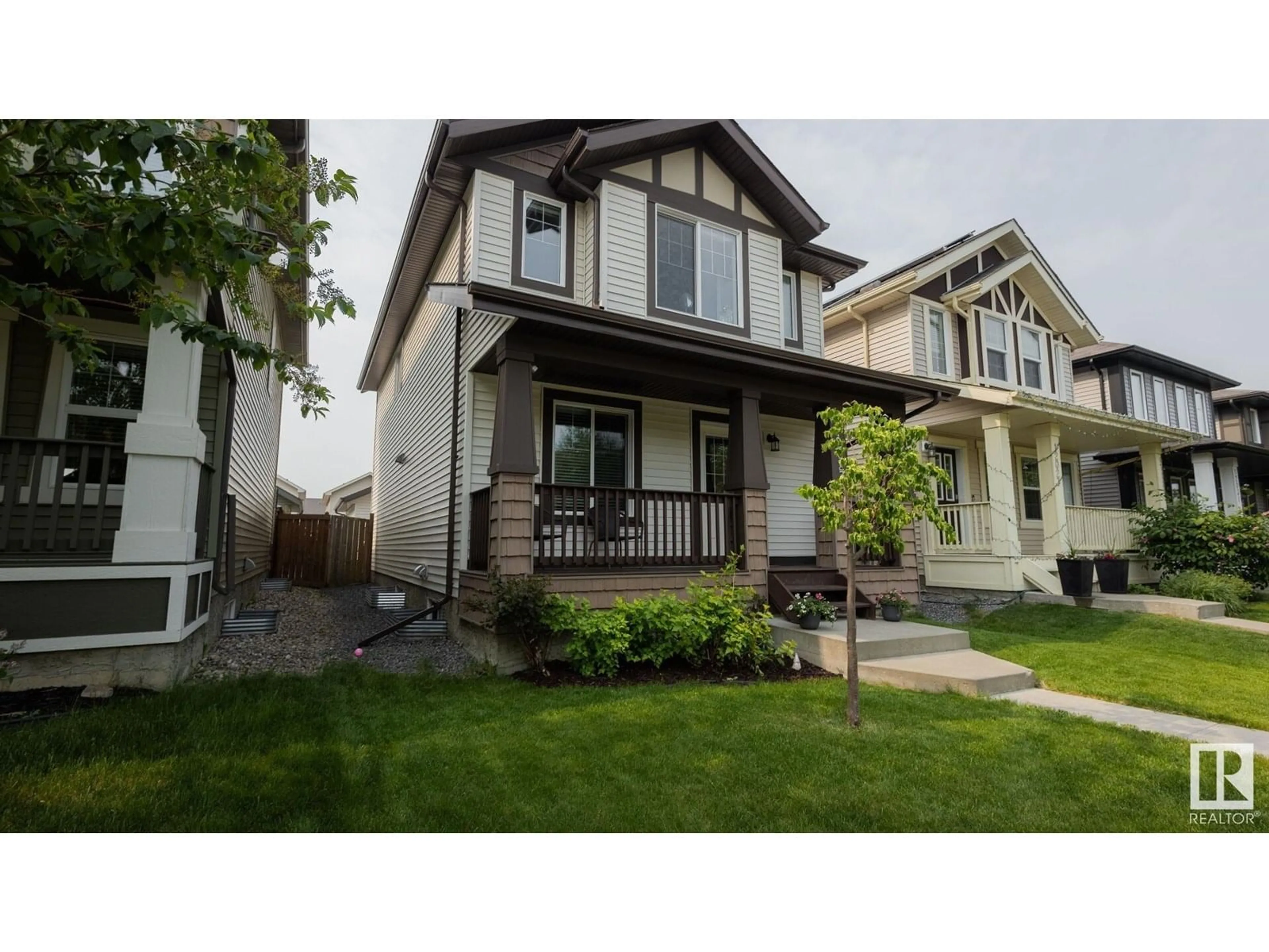Home with vinyl exterior material, street for NW - 12023 167B AV, Edmonton Alberta T5X0G6