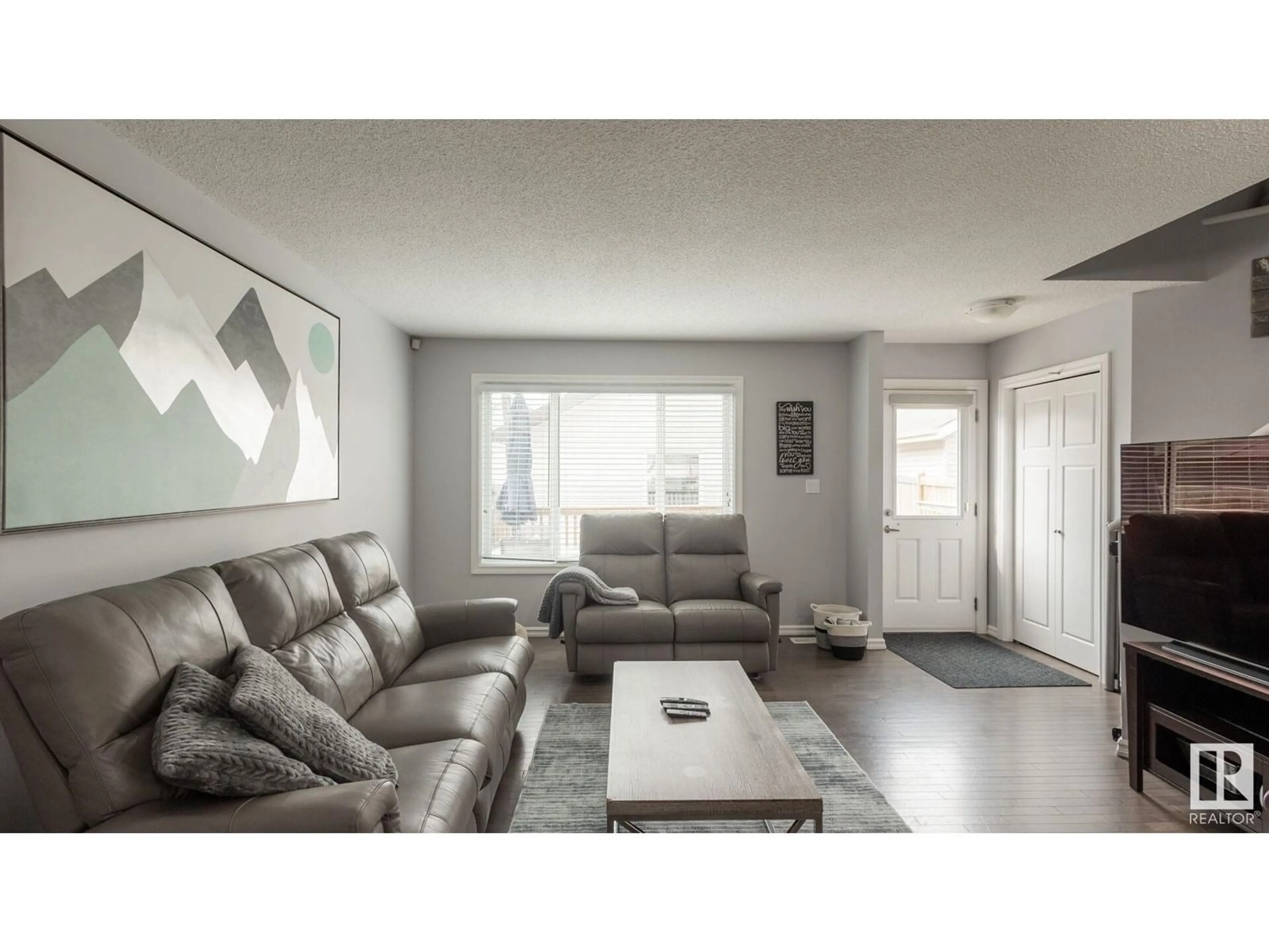 Living room with furniture, unknown for NW - 12023 167B AV, Edmonton Alberta T5X0G6