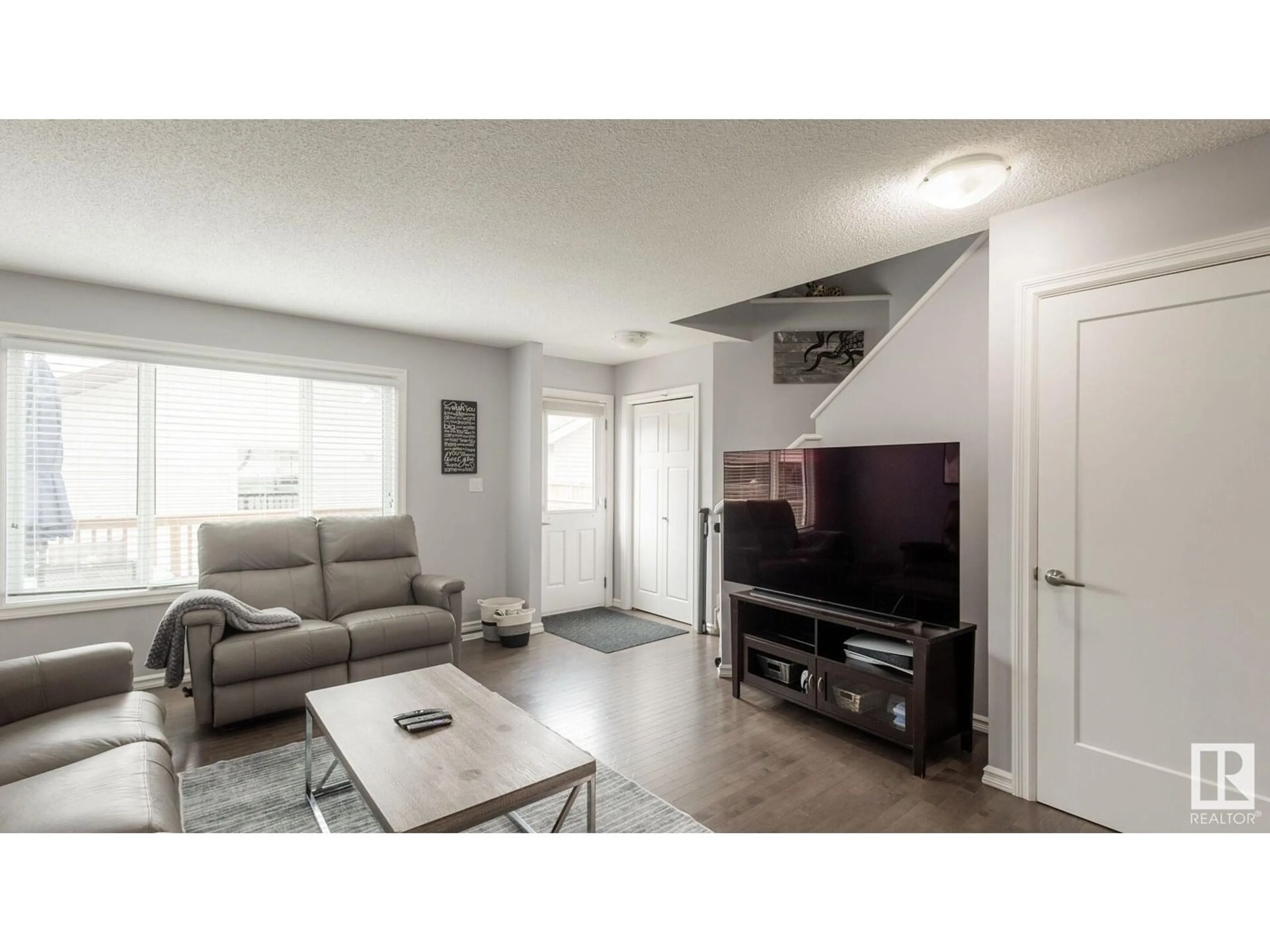 Living room with furniture, unknown for NW - 12023 167B AV, Edmonton Alberta T5X0G6