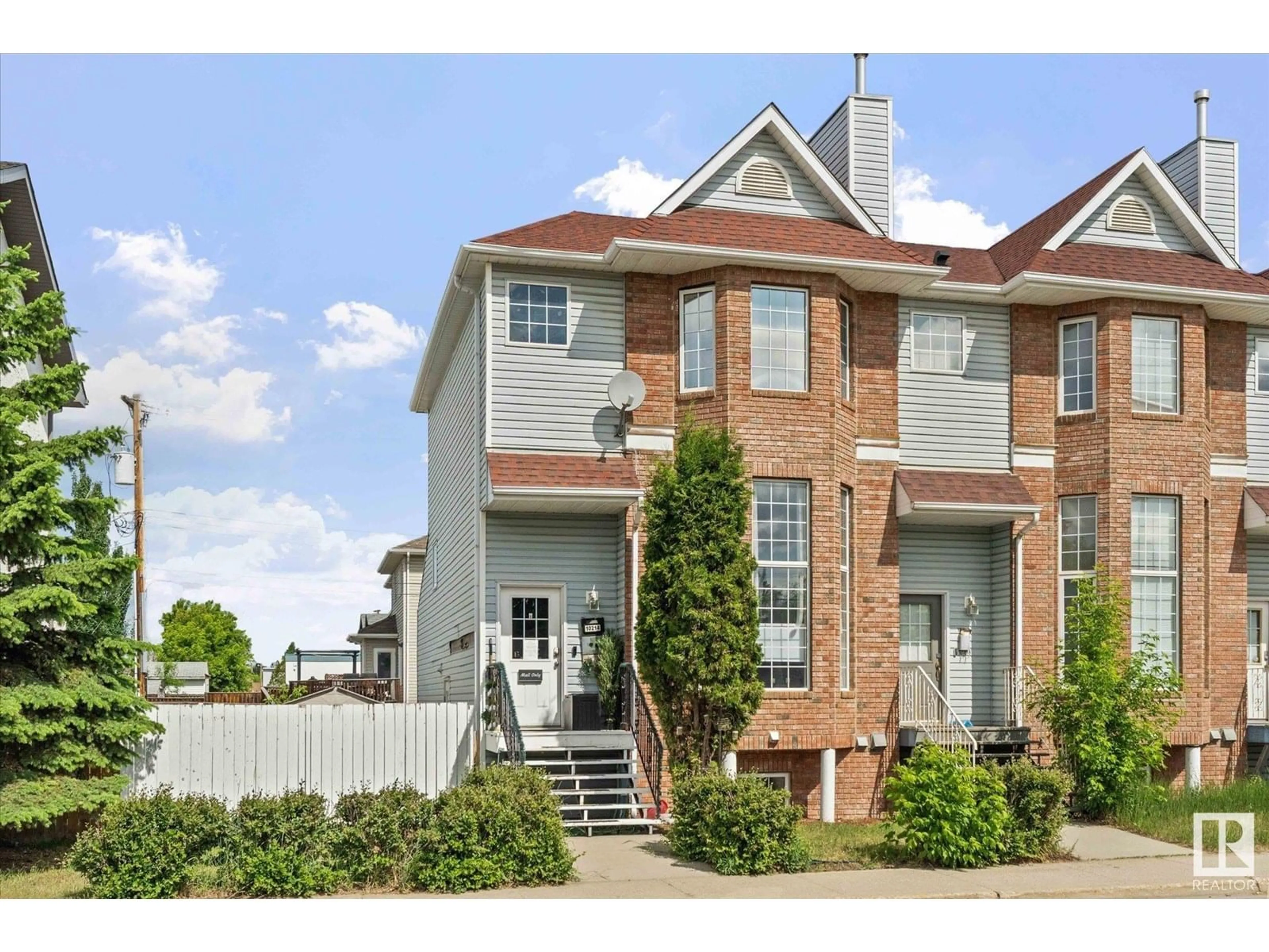 Home with brick exterior material, street for 10214 98 AV, Fort Saskatchewan Alberta T8L4E4