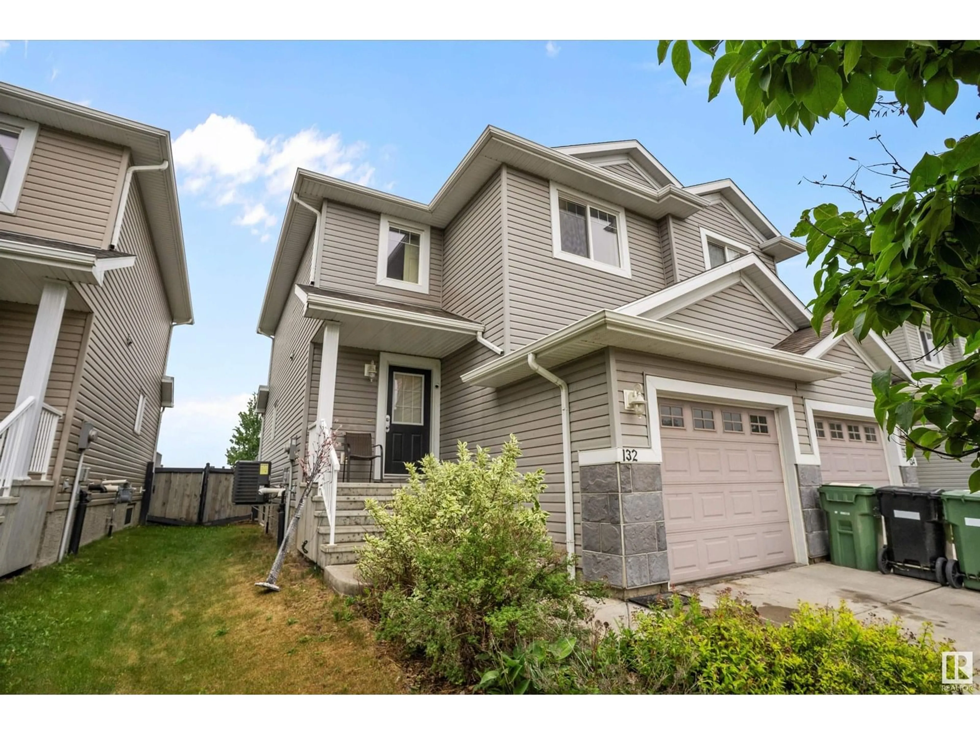 Home with vinyl exterior material, street for 132 KEYSTONE CR, Leduc Alberta T9E0M6