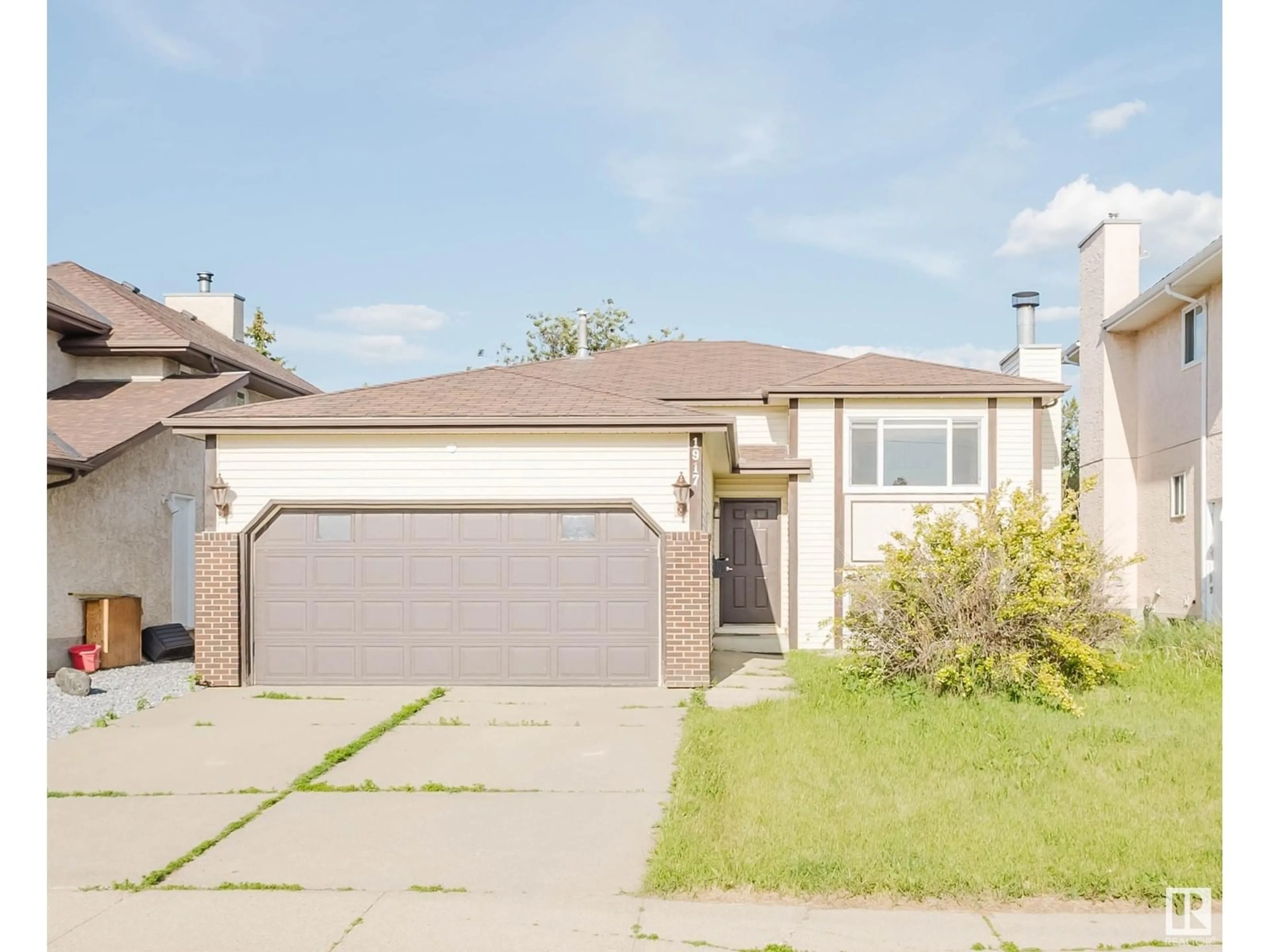 Home with vinyl exterior material, street for 1917 108 ST, Edmonton Alberta T6J5V4