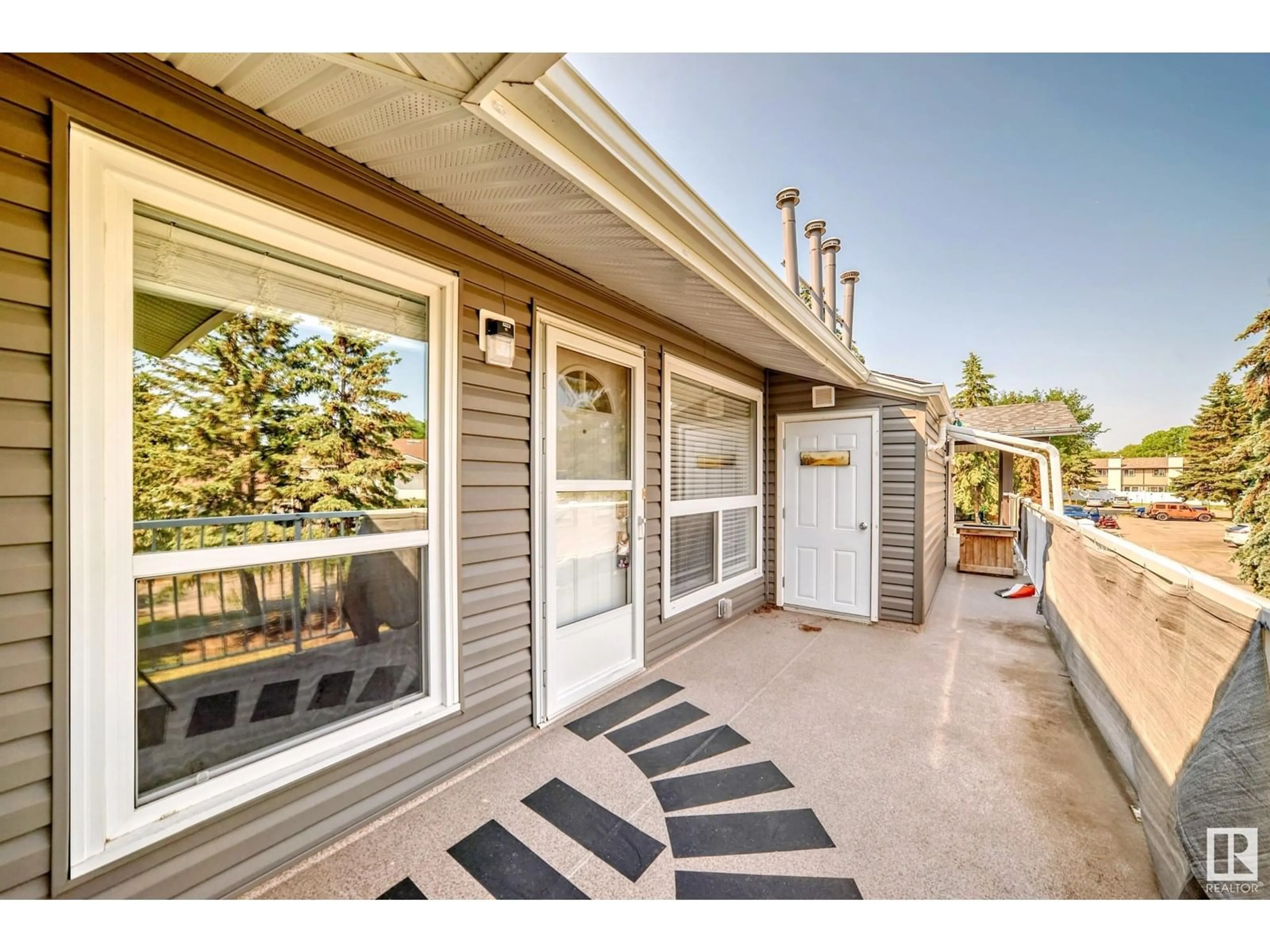 Patio, street for #11 - 3111 142 AV, Edmonton Alberta T5Y2H6