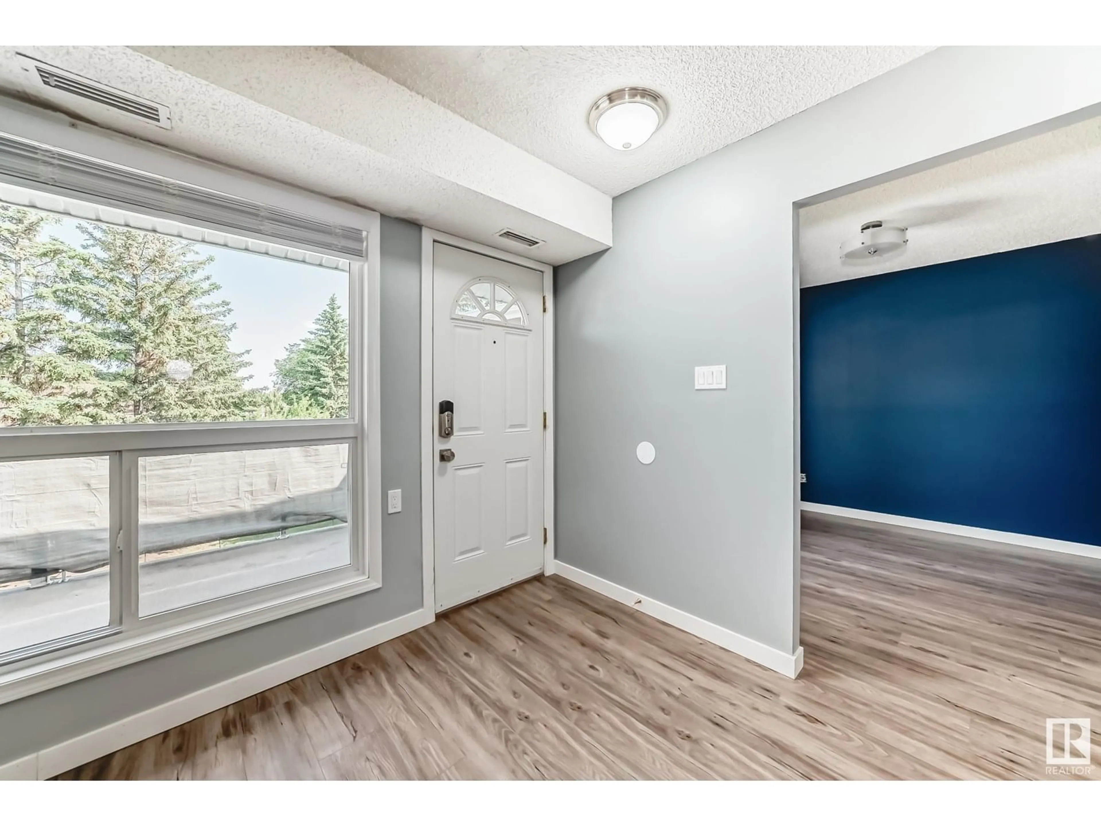 Indoor entryway for #11 - 3111 142 AV, Edmonton Alberta T5Y2H6