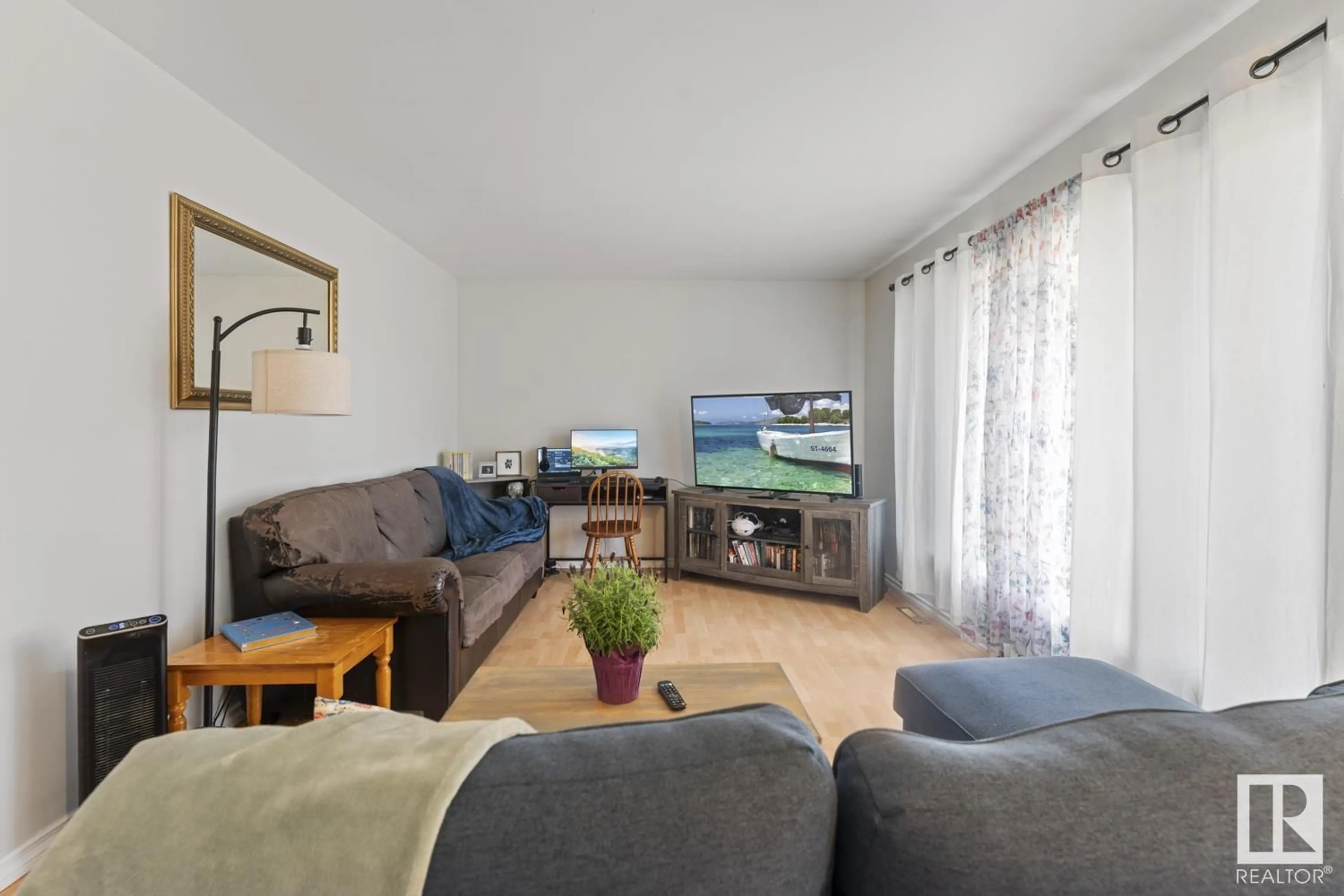Living room with furniture, wood/laminate floor for 603 12 AV, Cold Lake Alberta T9M1H5