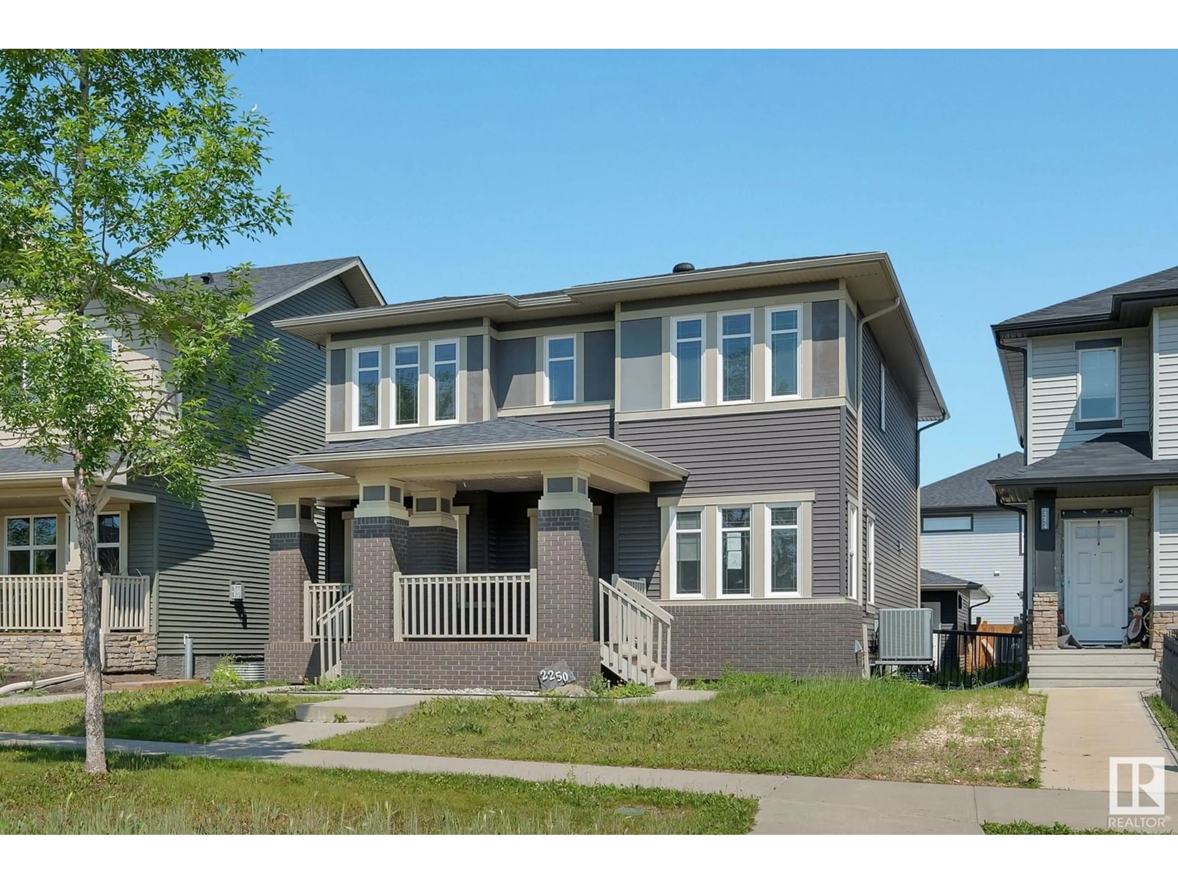 Home with vinyl exterior material, street for 2250 ASPEN TR, Sherwood Park Alberta T8H0W4