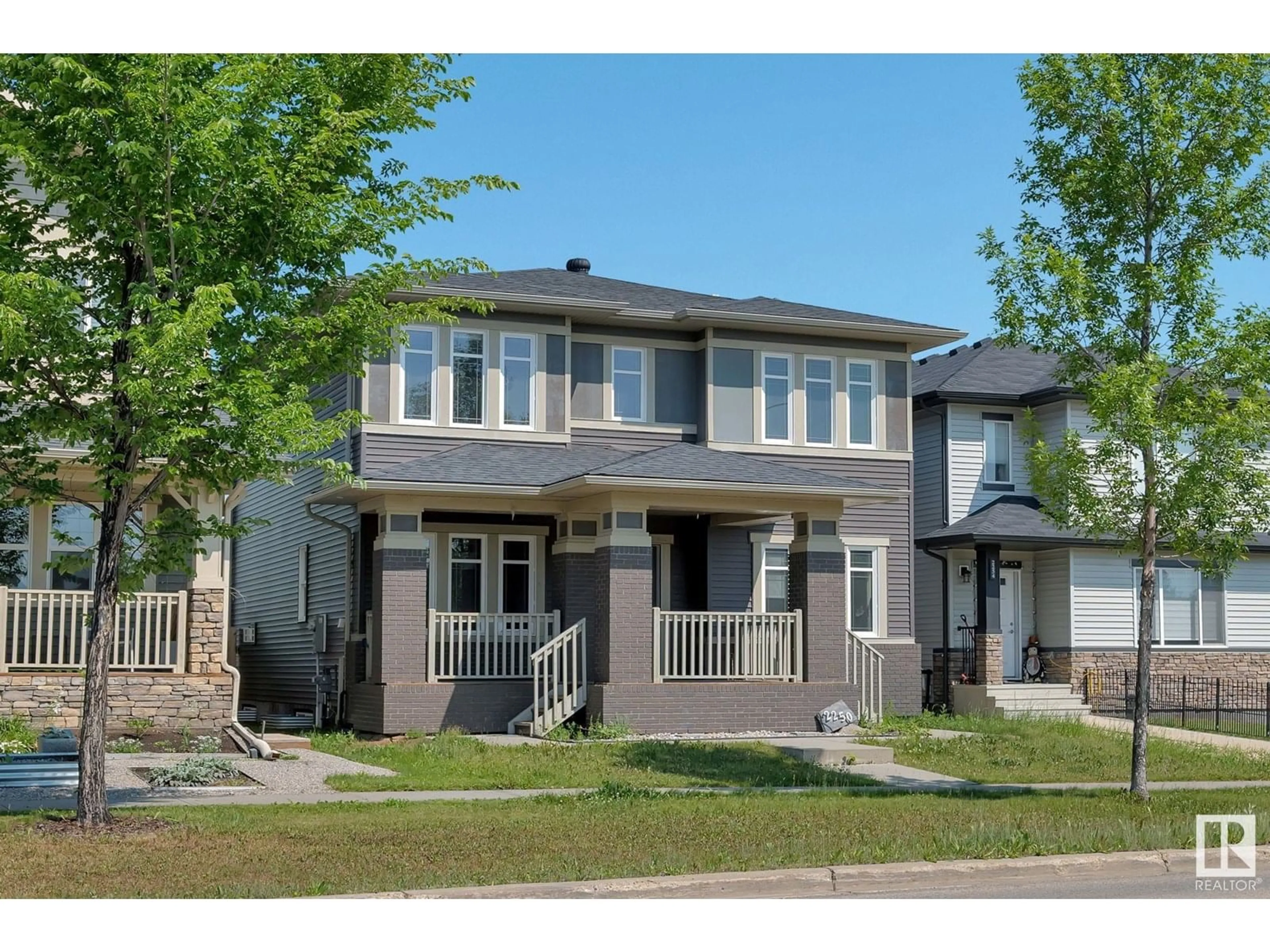 Home with vinyl exterior material, street for 2250 ASPEN TR, Sherwood Park Alberta T8H0W4