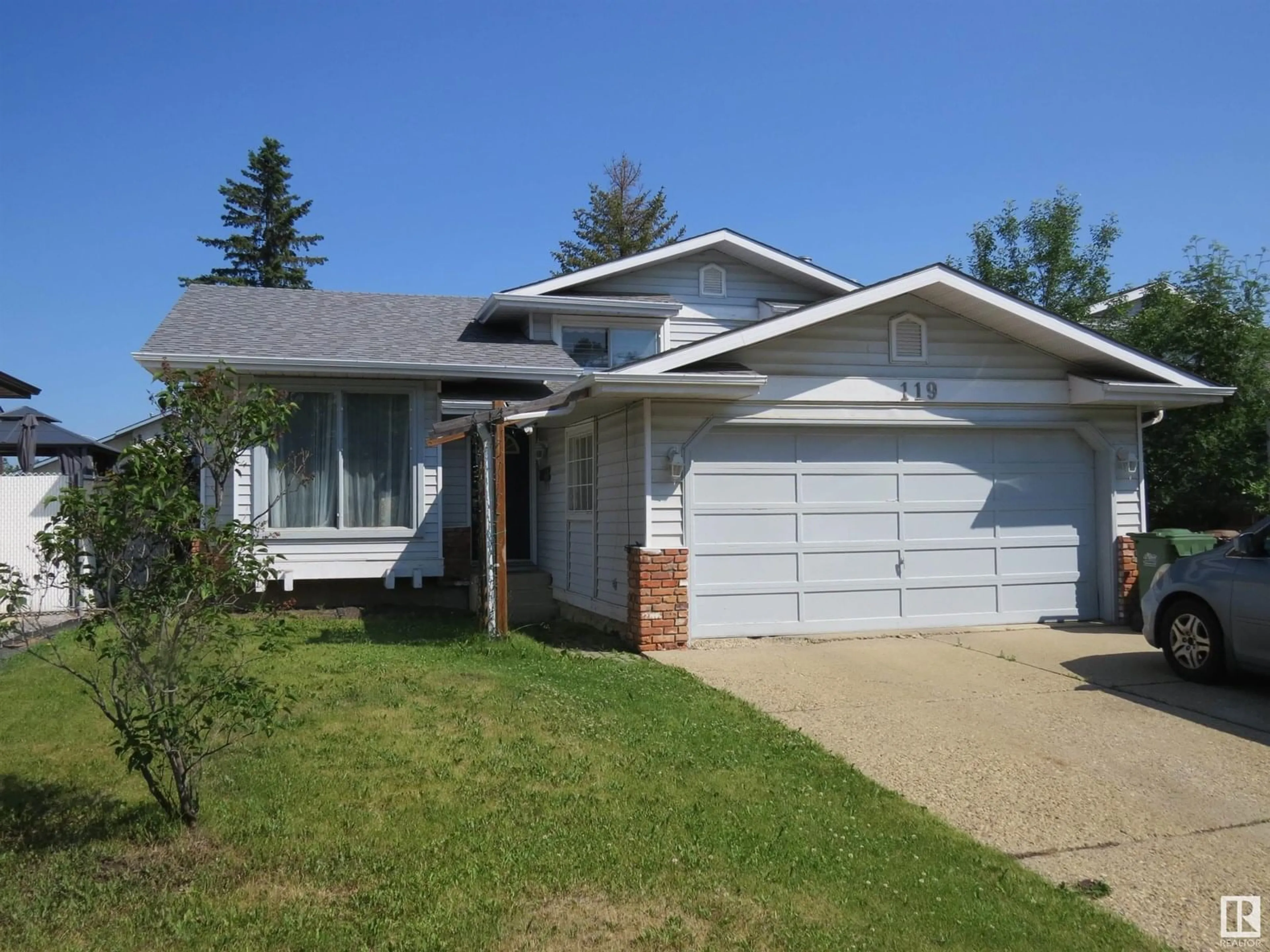 Home with vinyl exterior material, street for 119 DORCHESTER DR, St. Albert Alberta T8N4Y4