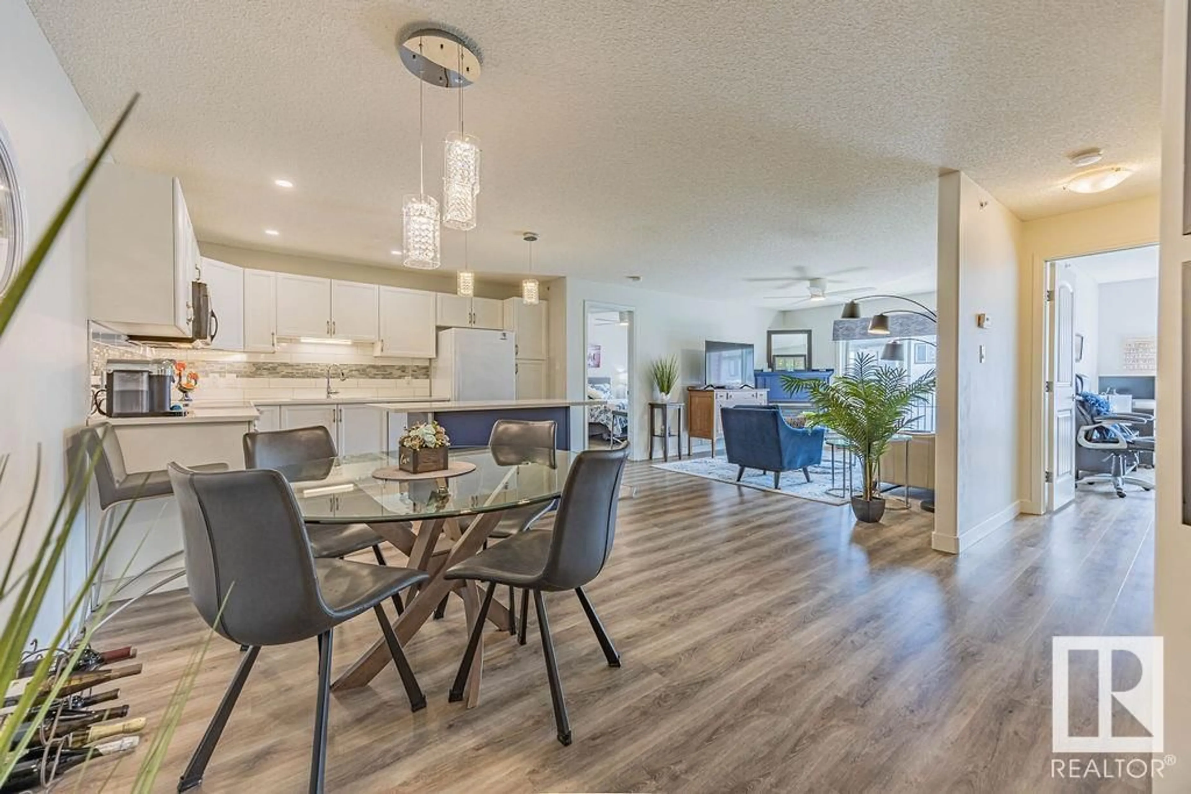 Open concept kitchen, wood/laminate floor for #403 - 17407 99 AV, Edmonton Alberta T5T0W7