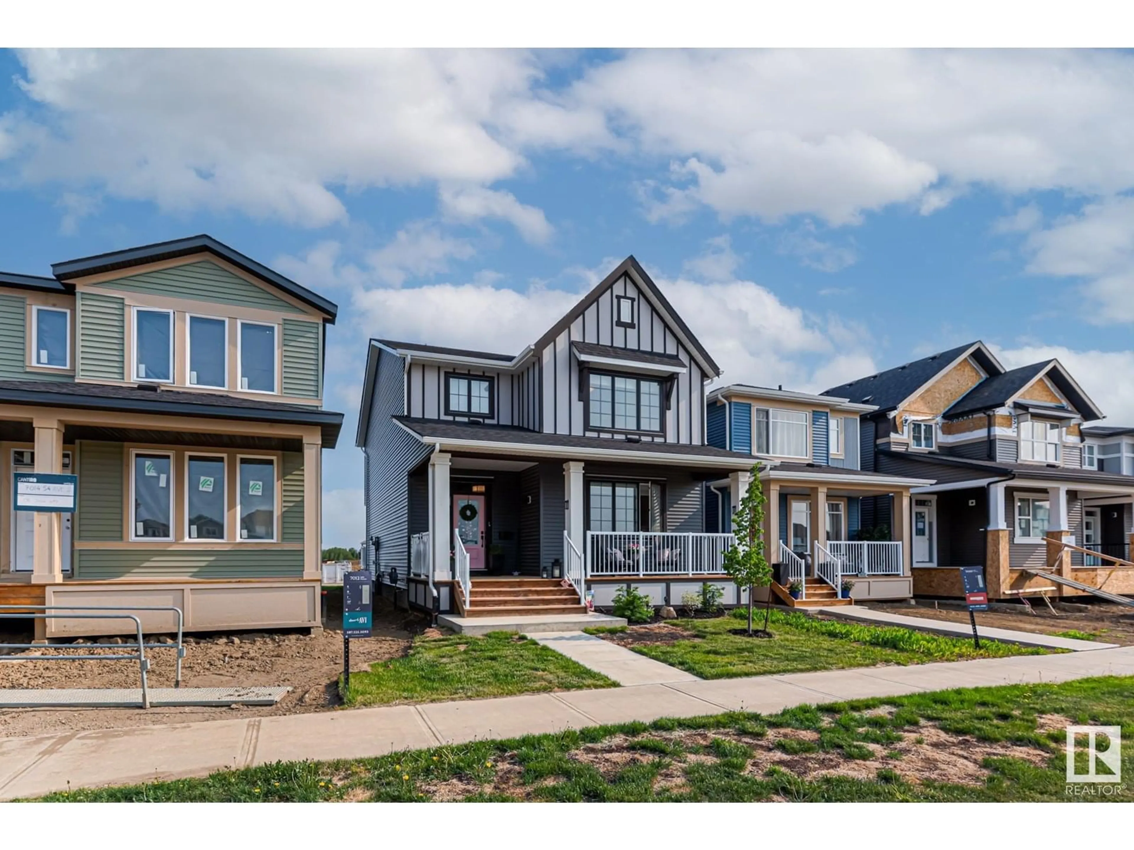Home with vinyl exterior material, street for 7012 54 AV, Beaumont Alberta T4X2Z9