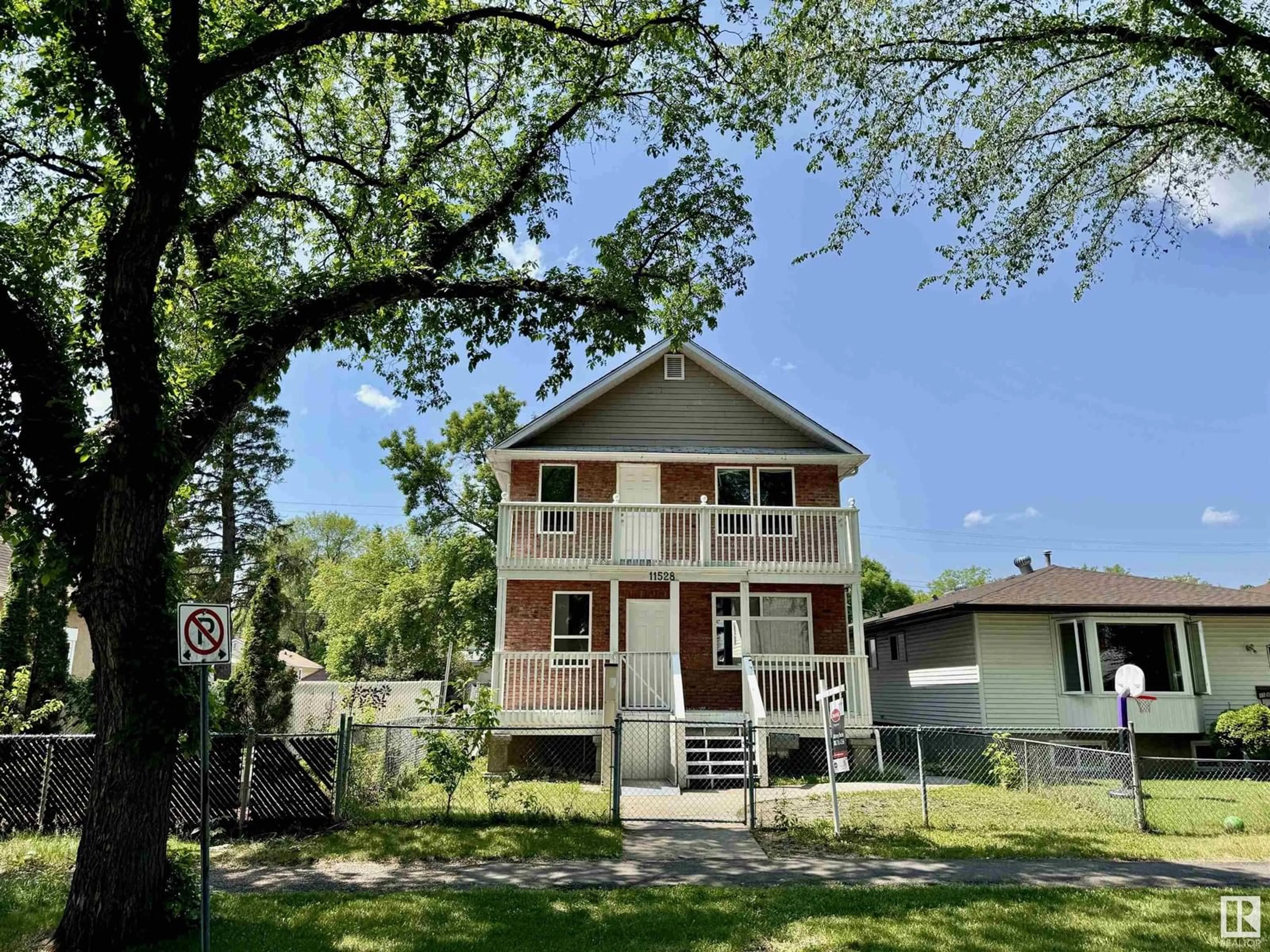 A pic from outside/outdoor area/front of a property/back of a property/a pic from drone, street for 11528 85 ST, Edmonton Alberta T5B3E2