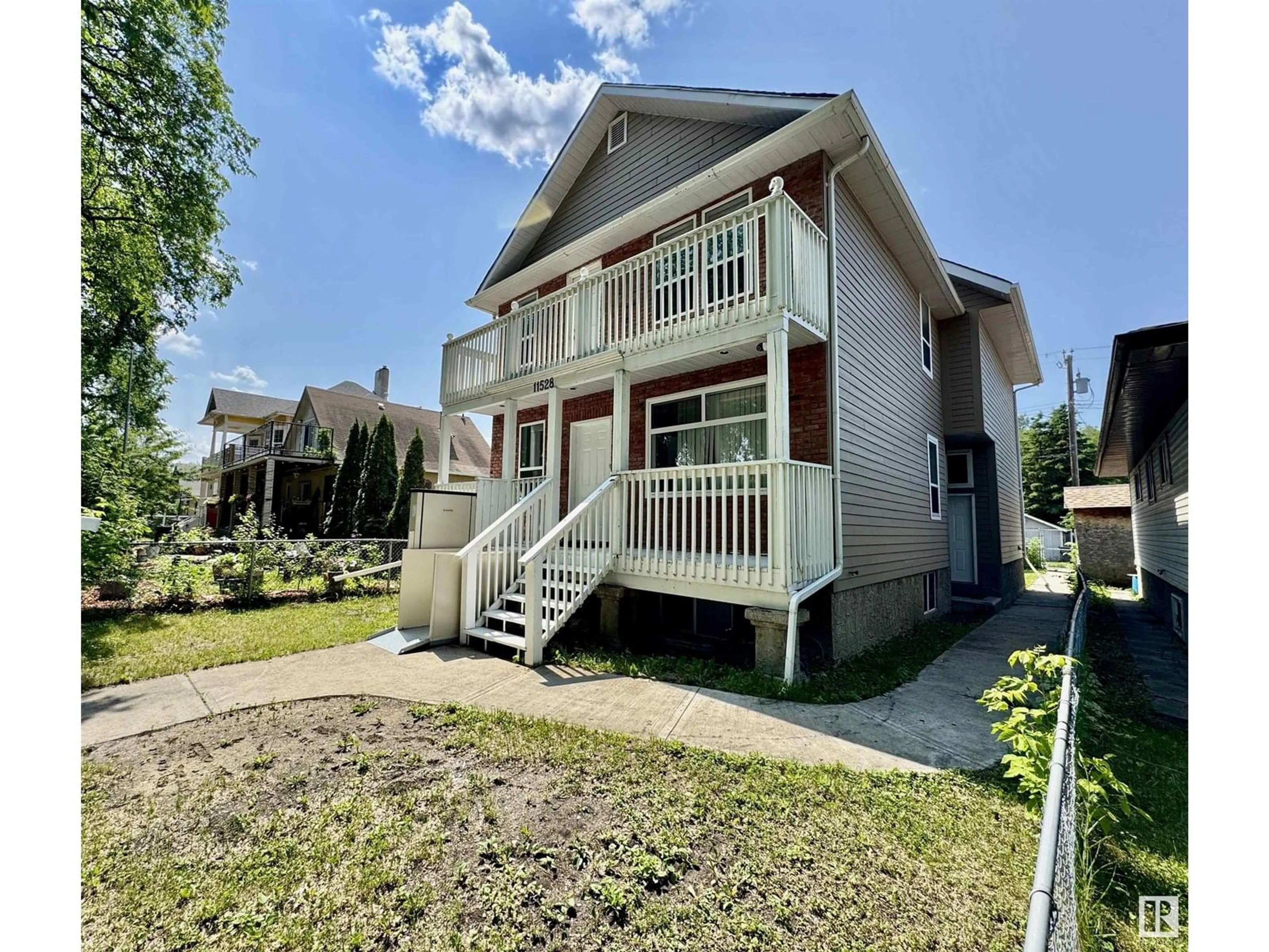 A pic from outside/outdoor area/front of a property/back of a property/a pic from drone, street for 11528 85 ST, Edmonton Alberta T5B3E2
