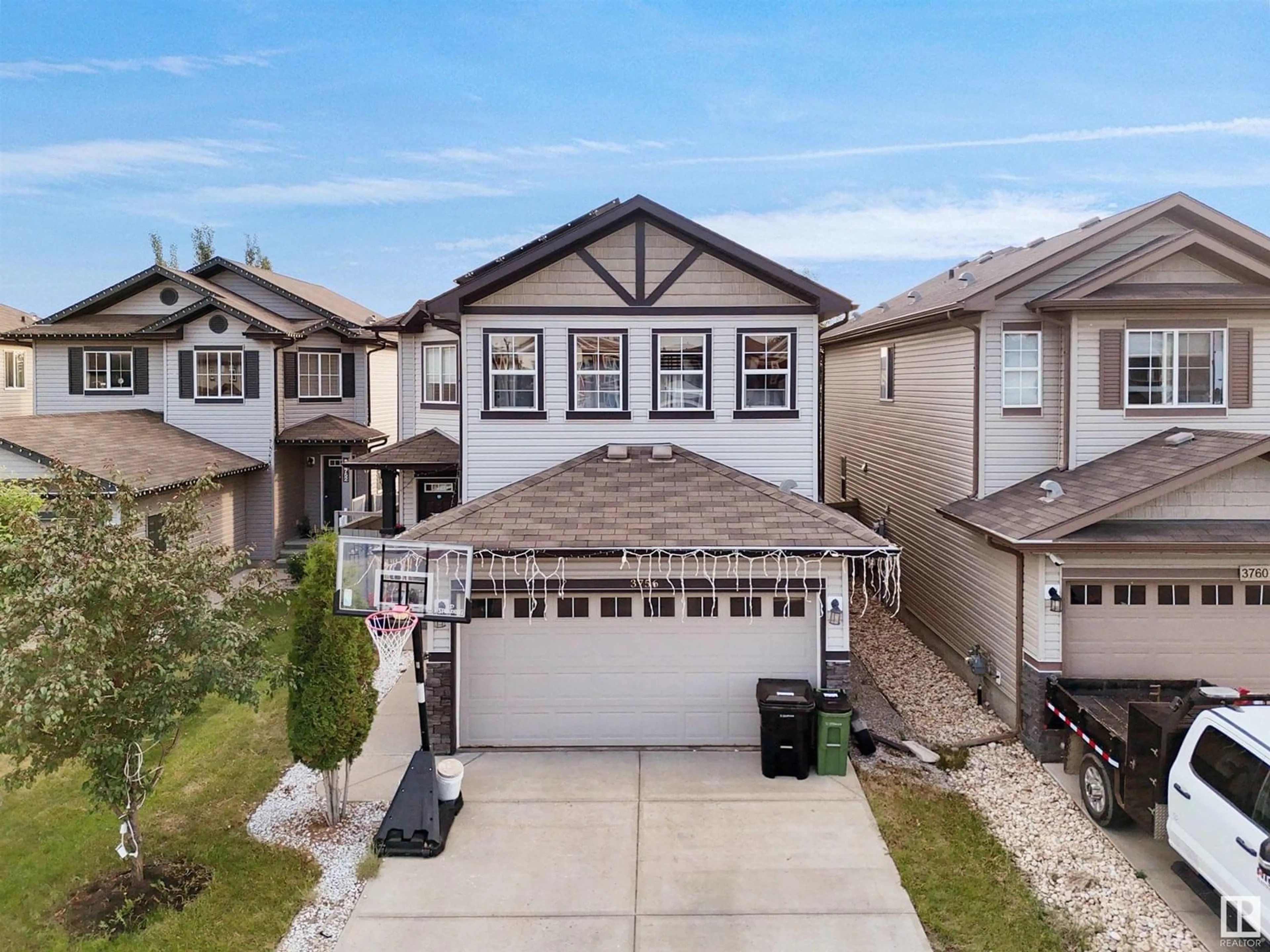 A pic from outside/outdoor area/front of a property/back of a property/a pic from drone, street for 3756 8 ST, Edmonton Alberta T6T0S1