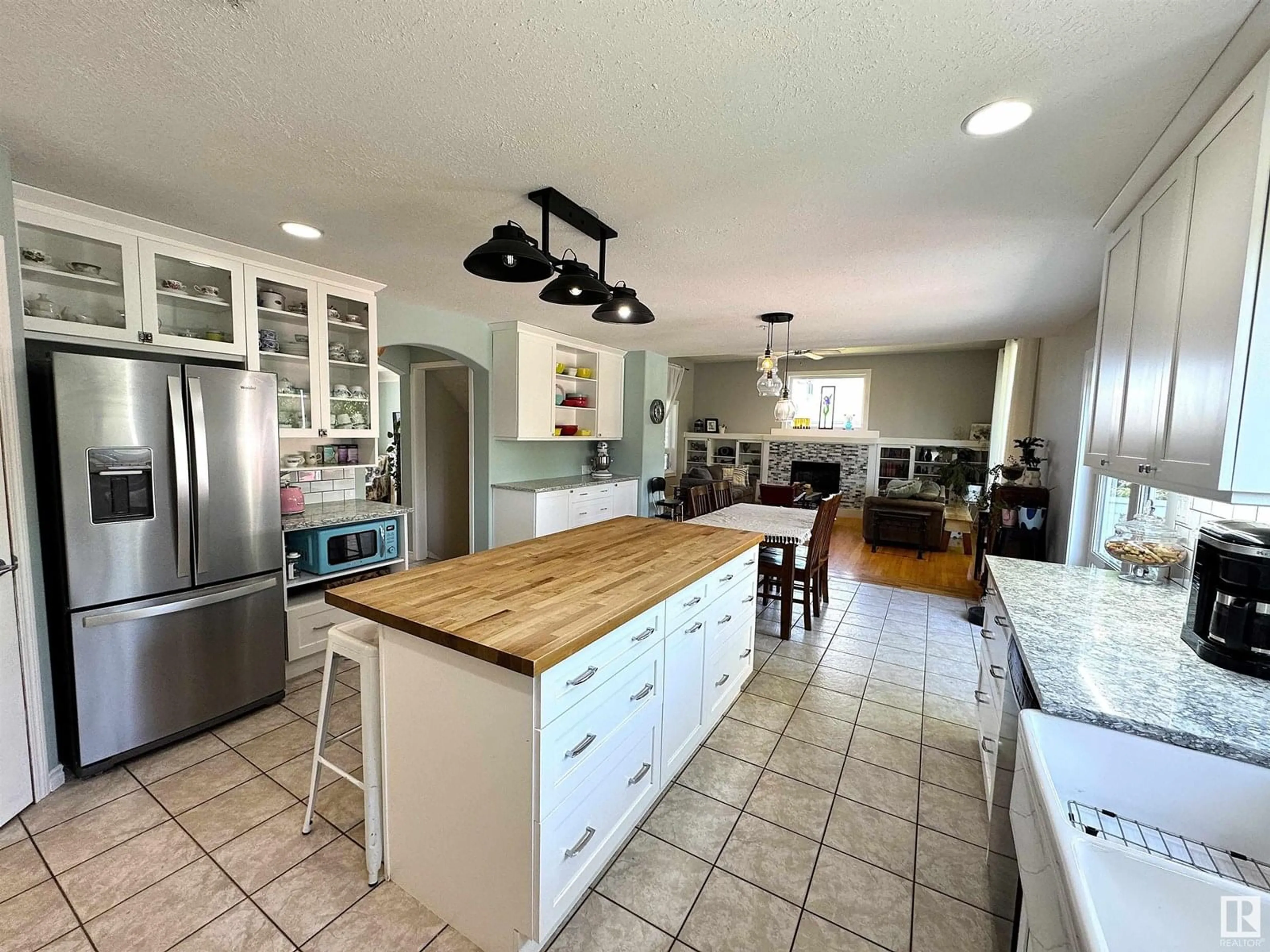 Open concept kitchen, ceramic/tile floor for #302 - 53302 RANGE ROAD 261, Rural Parkland County Alberta T7Y1A7
