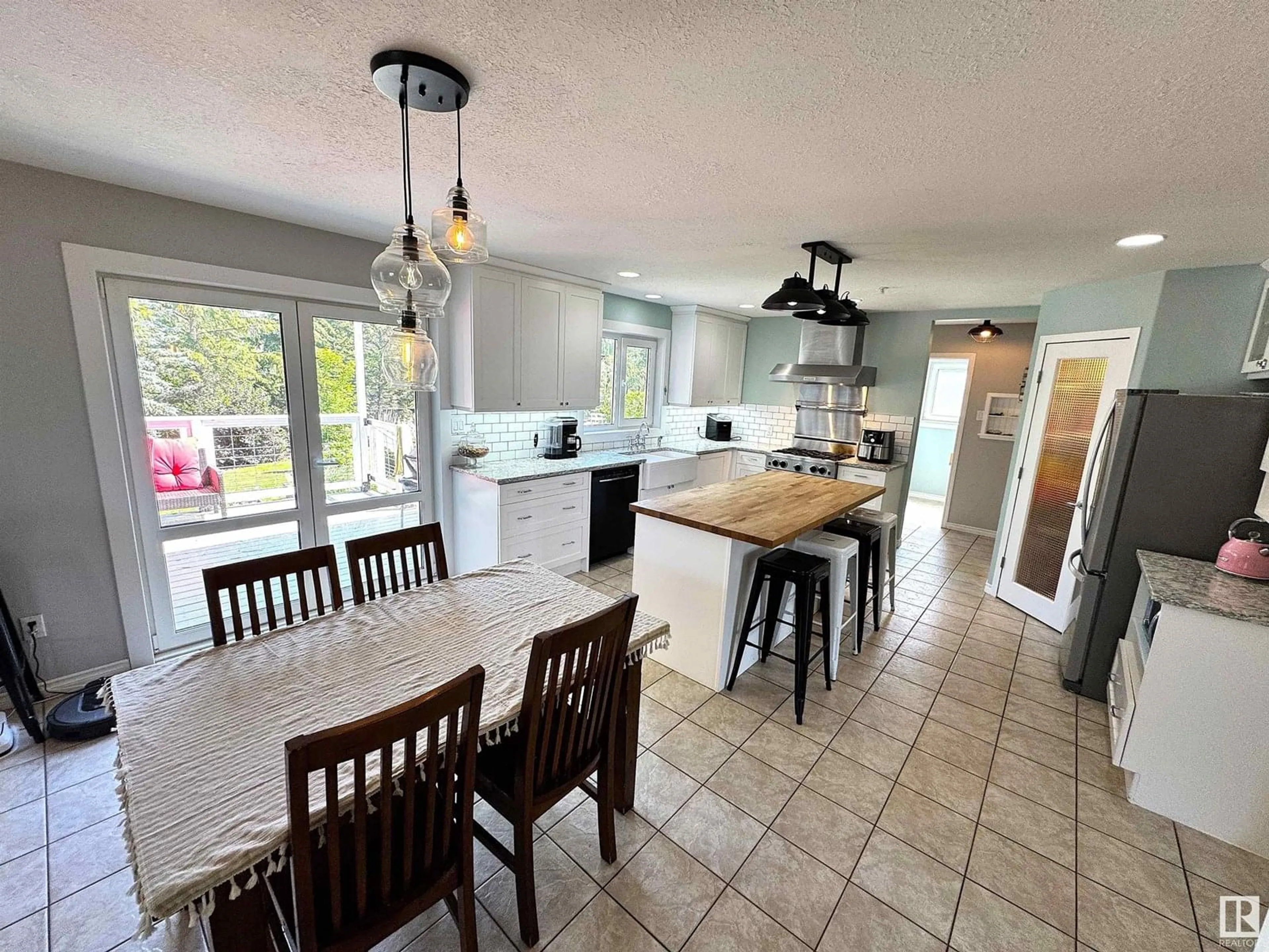Open concept kitchen, ceramic/tile floor for #302 - 53302 RANGE ROAD 261, Rural Parkland County Alberta T7Y1A7