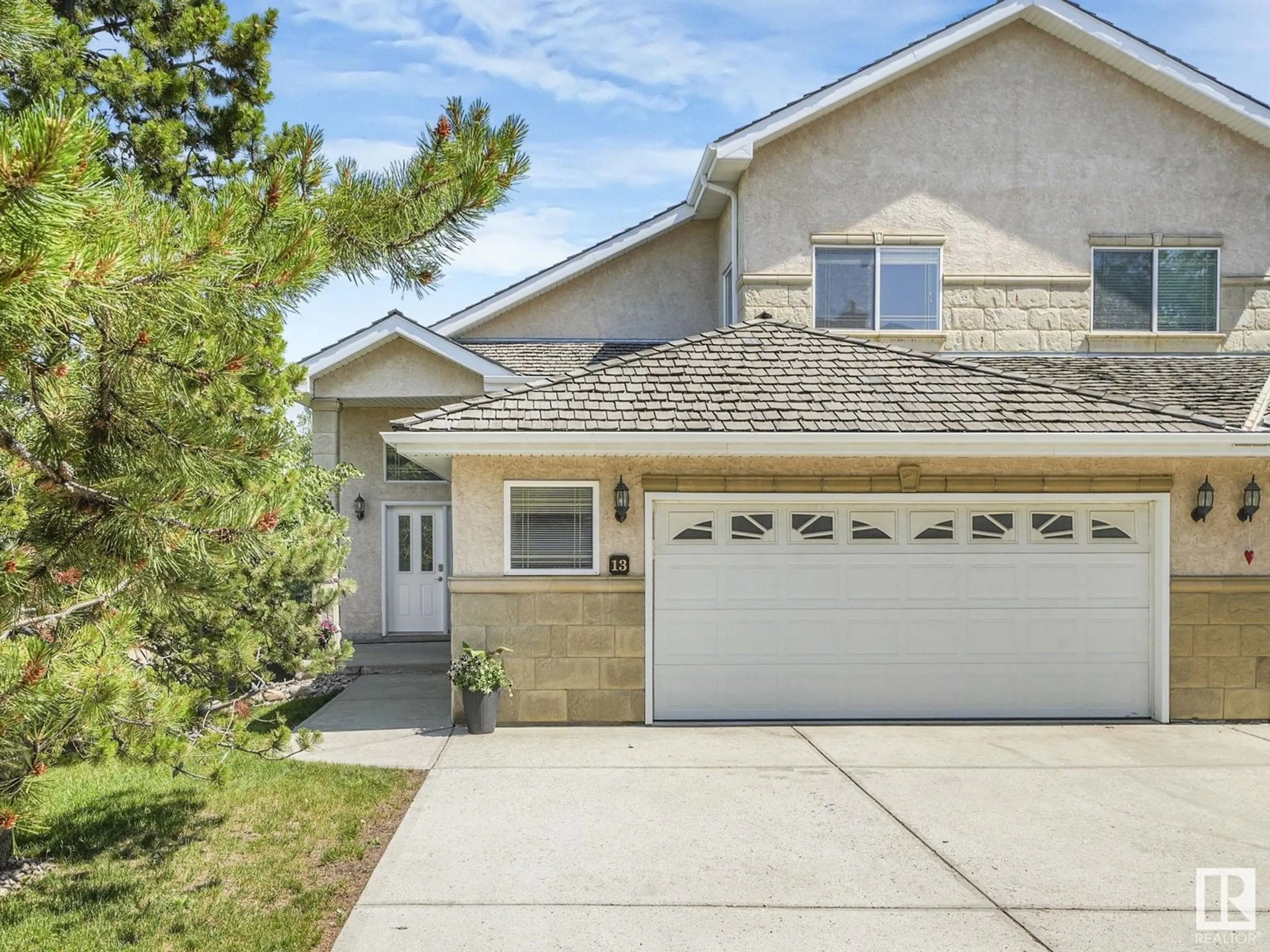 Home with vinyl exterior material, street for 13 - 577 BUTTERWORTH WY, Edmonton Alberta T6R2Y2