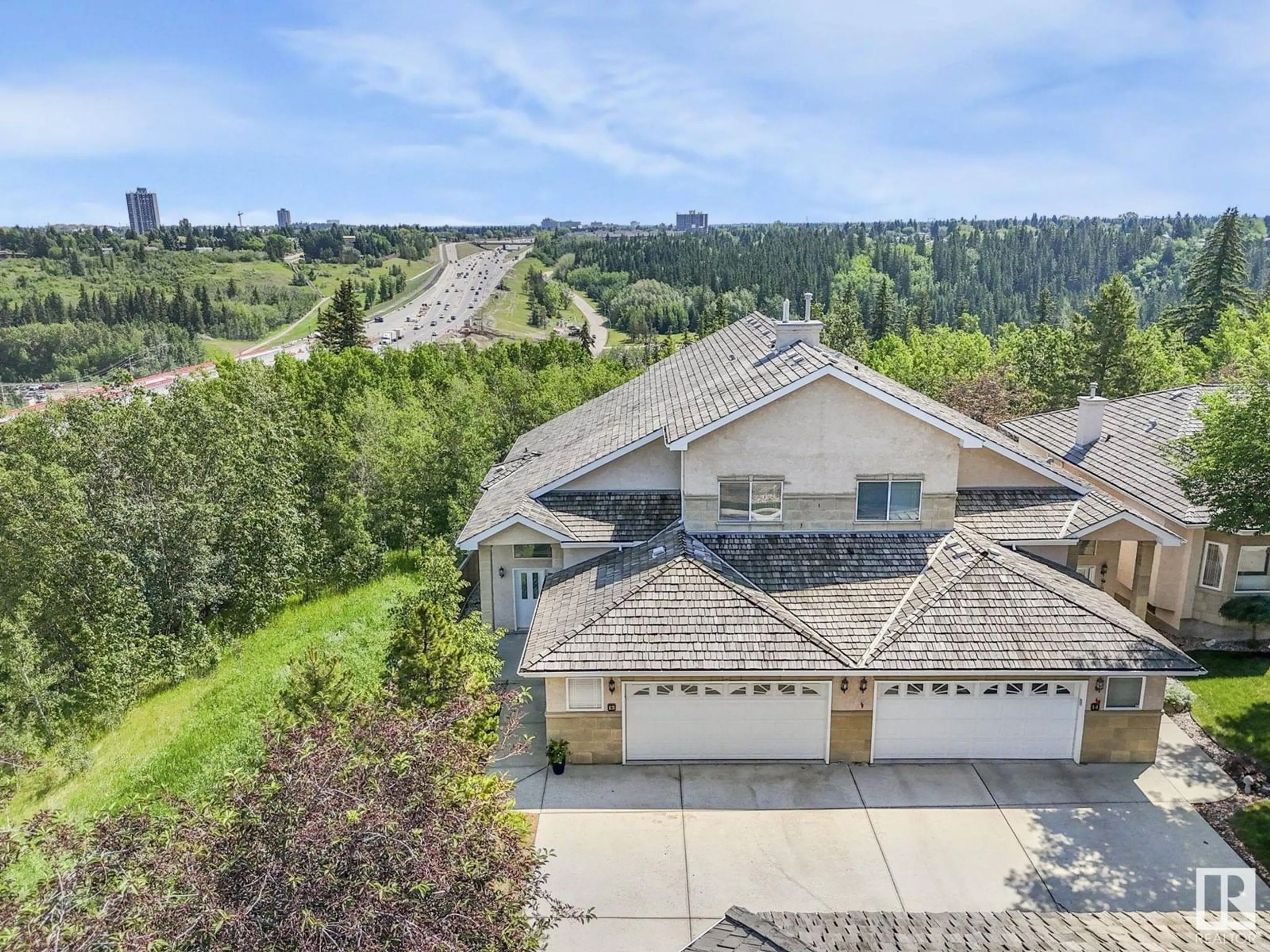 A pic from outside/outdoor area/front of a property/back of a property/a pic from drone, water/lake/river/ocean view for 13 - 577 BUTTERWORTH WY, Edmonton Alberta T6R2Y2