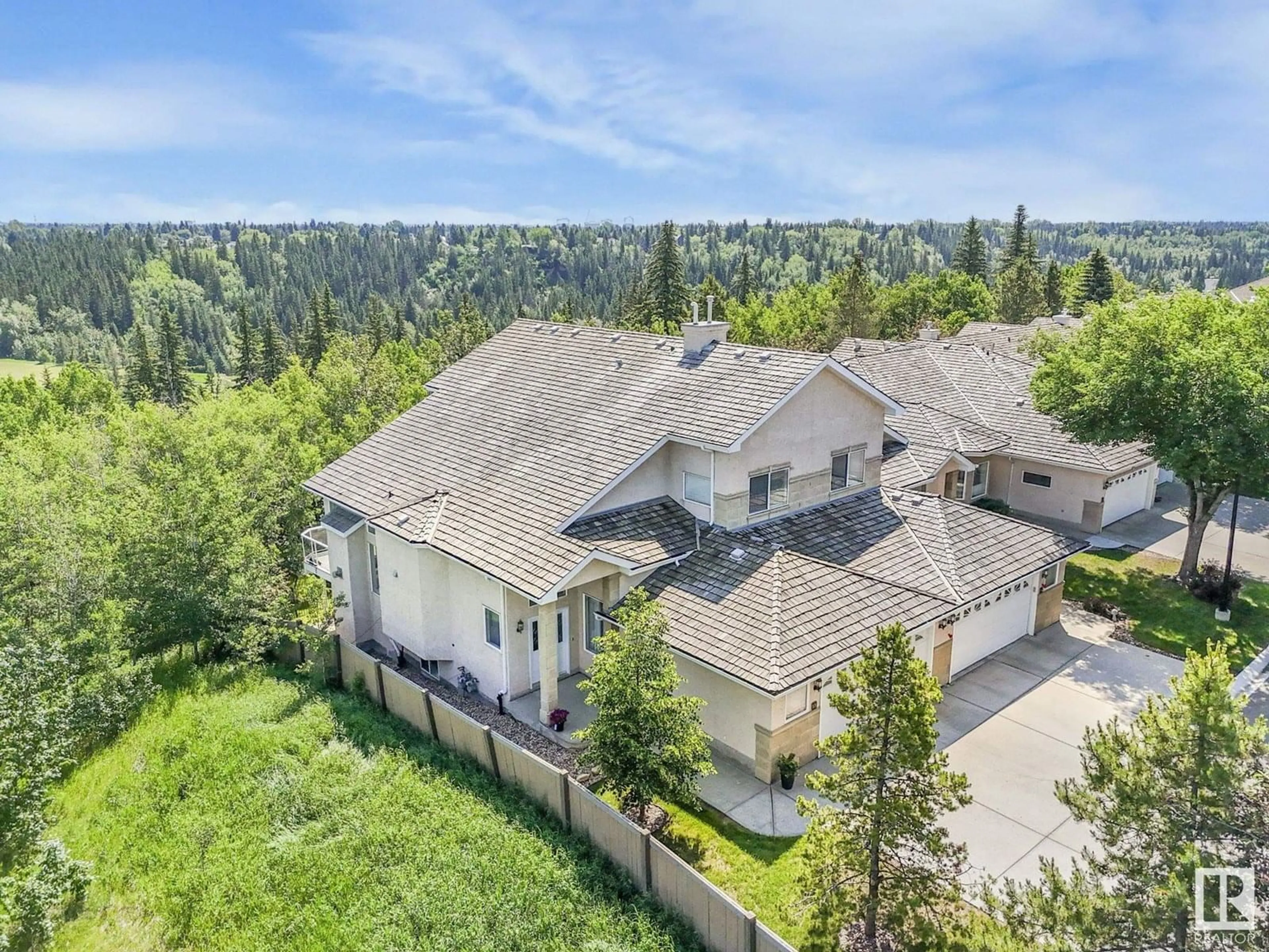 A pic from outside/outdoor area/front of a property/back of a property/a pic from drone, mountain view for 13 - 577 BUTTERWORTH WY, Edmonton Alberta T6R2Y2