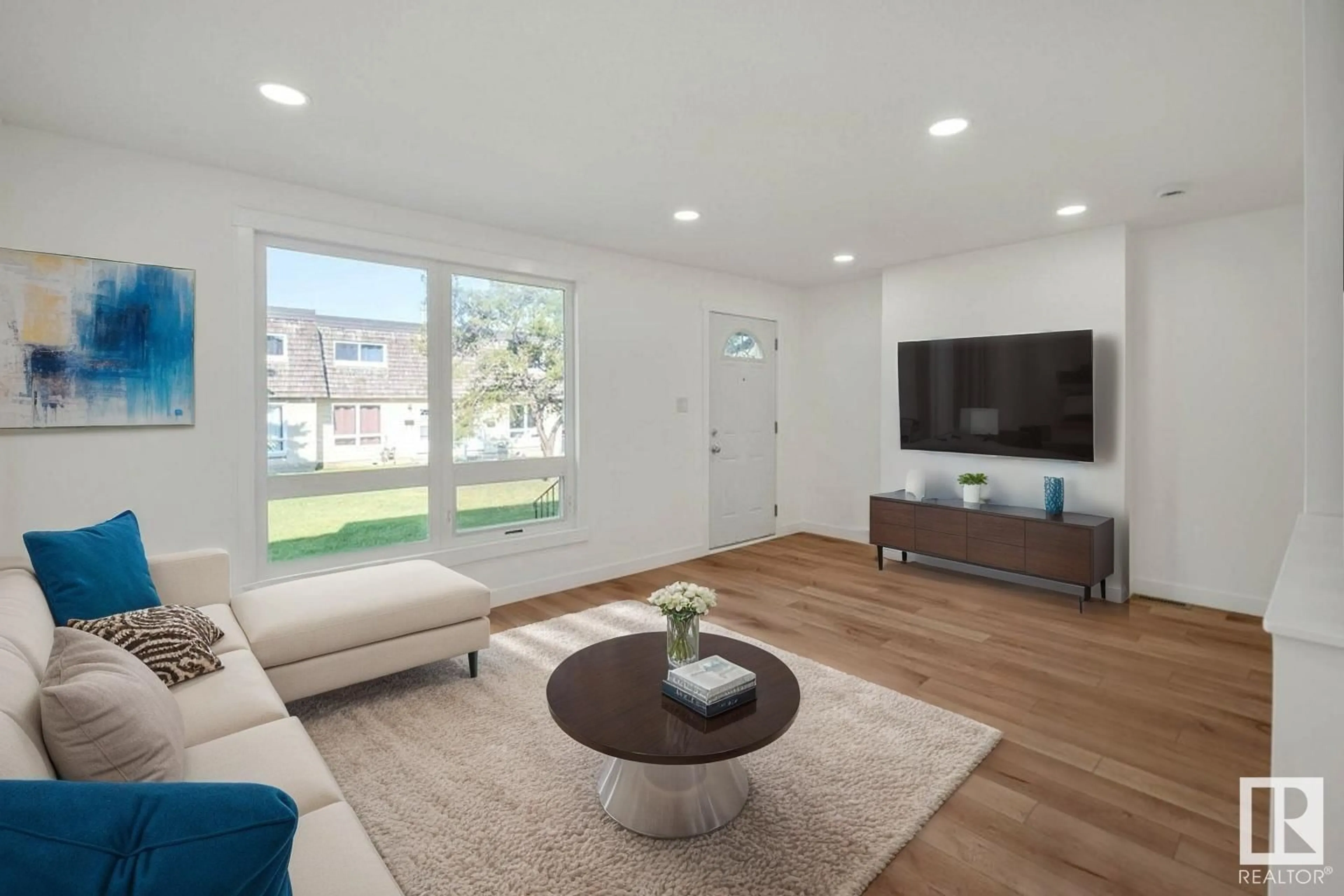 Living room with furniture, wood/laminate floor for 138 MAYFAIR MEWS, Edmonton Alberta T5E5R7