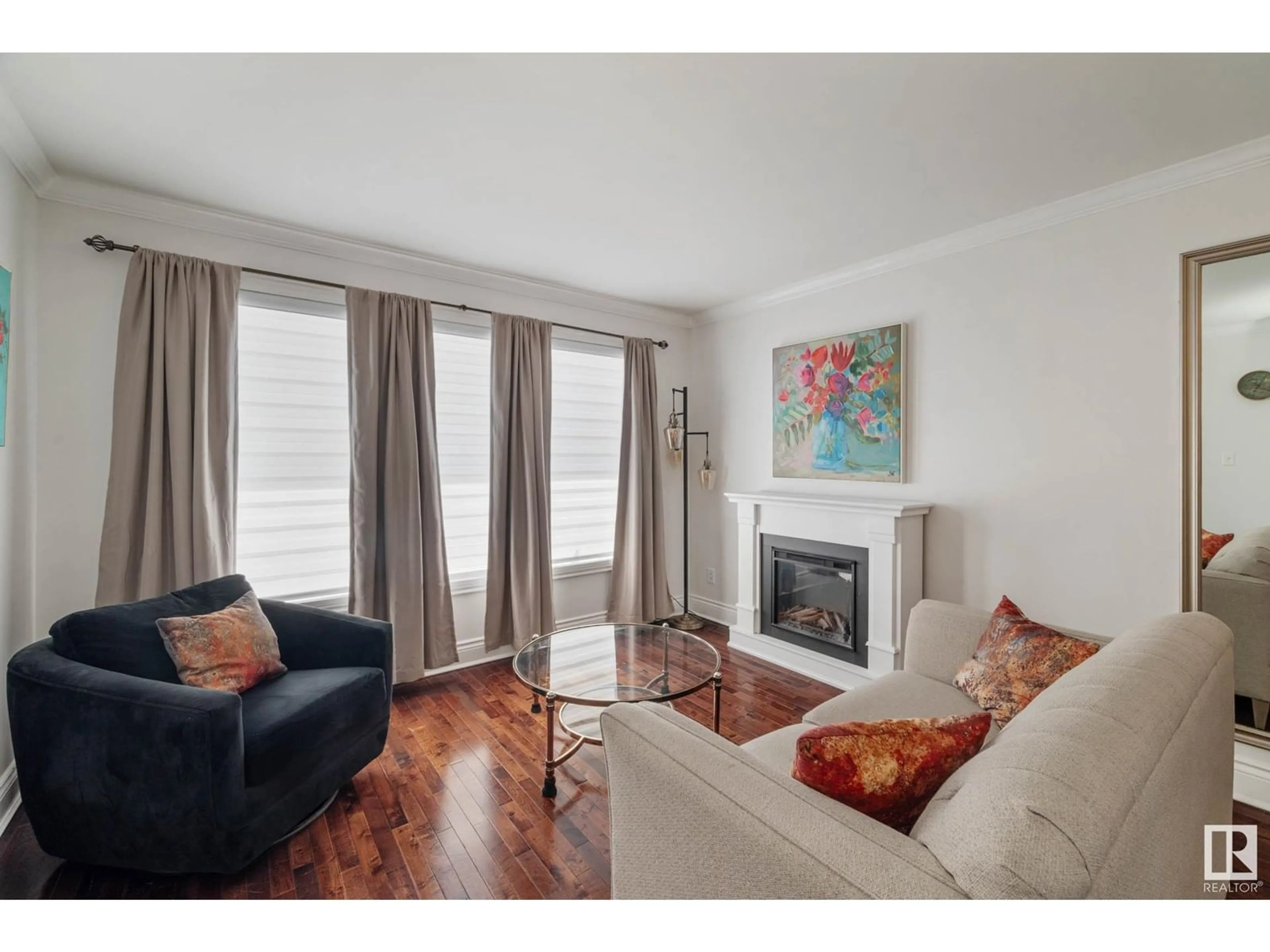 Living room with furniture, wood/laminate floor for NW - 15712 84 ST, Edmonton Alberta T5Z2P2