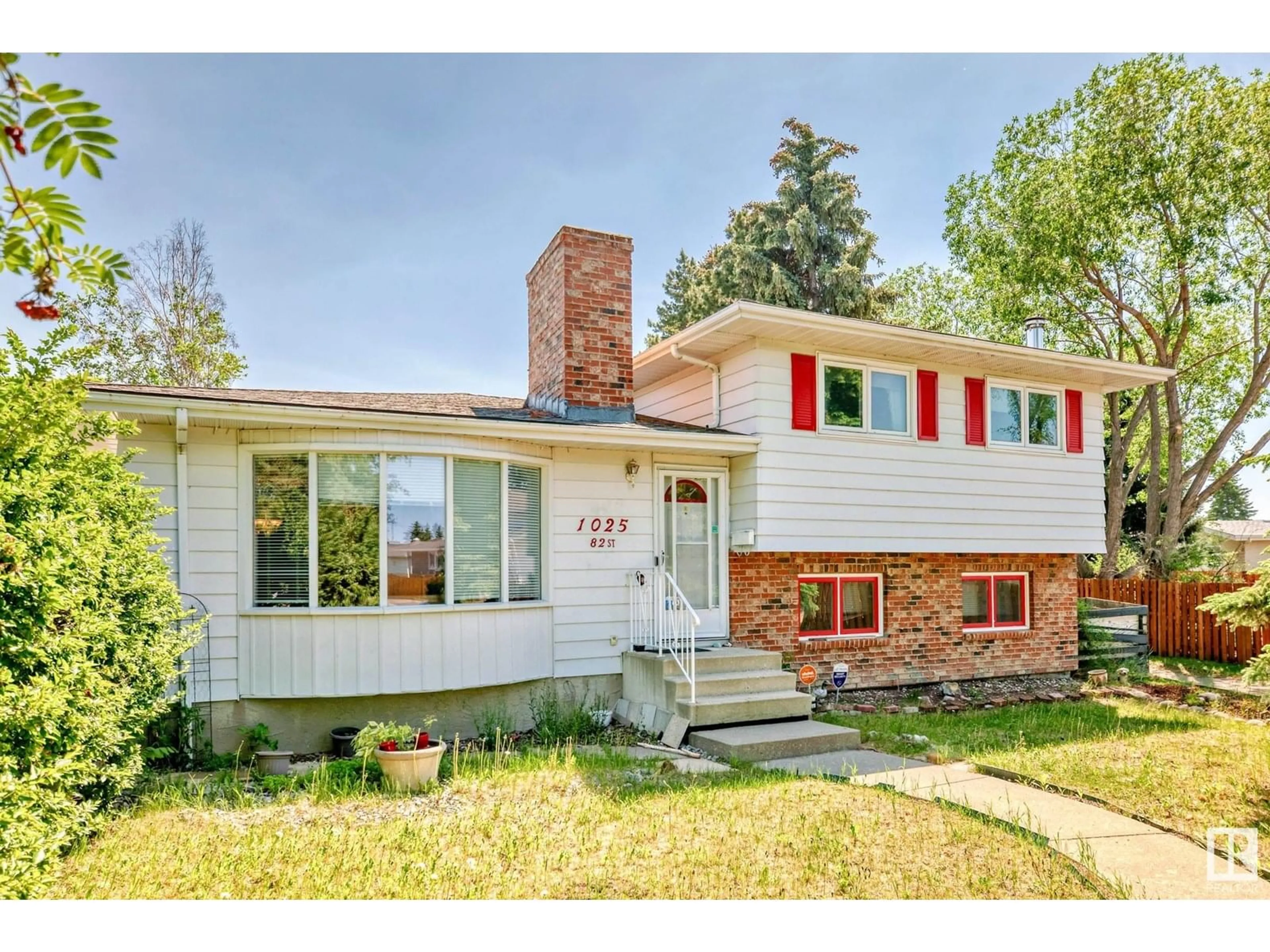 Home with brick exterior material, street for NW - 1025 82 ST, Edmonton Alberta T6K1X5