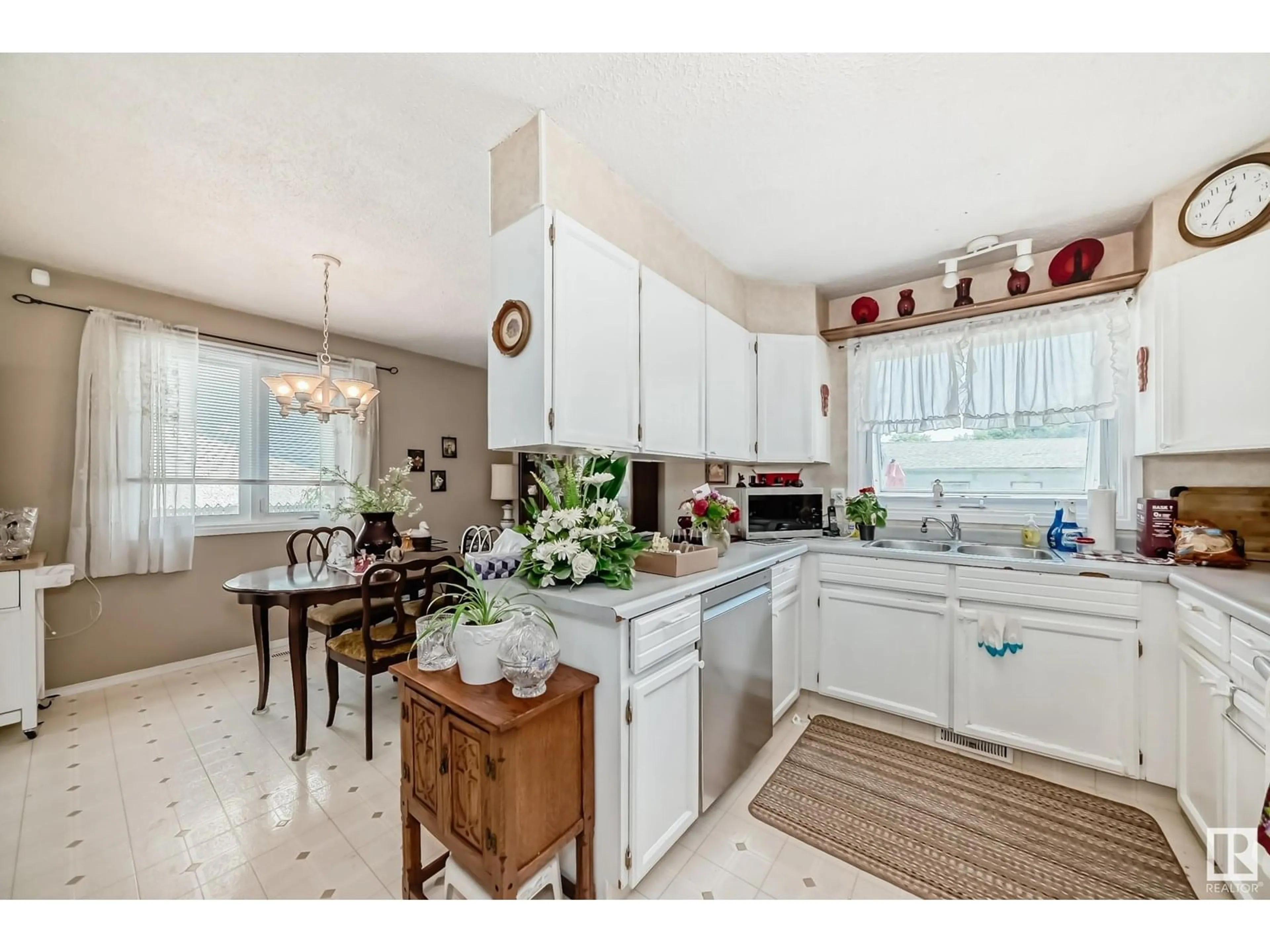 Open concept kitchen, ceramic/tile floor for NW - 1025 82 ST, Edmonton Alberta T6K1X5