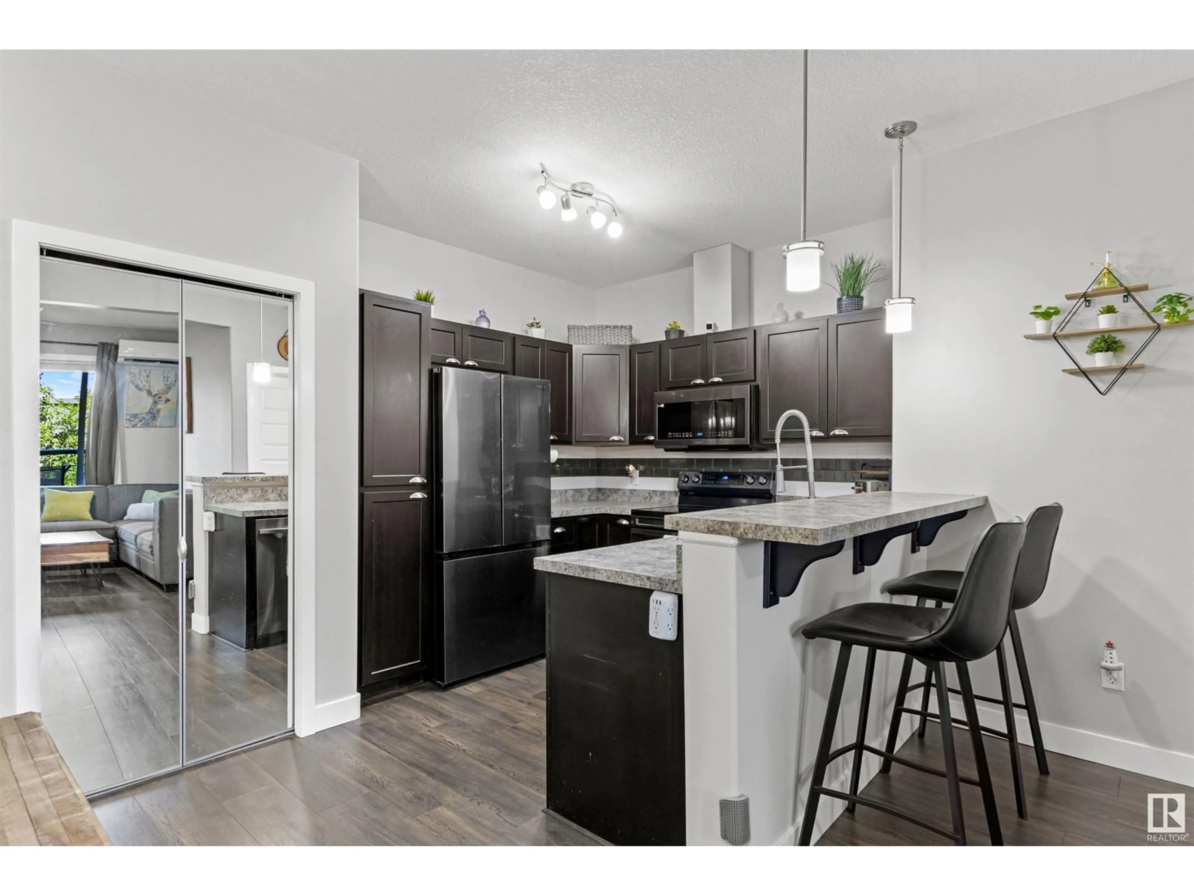 Open concept kitchen, unknown for 304 - 124 AMBLESIDE LINK LI, Edmonton Alberta T6W0V2