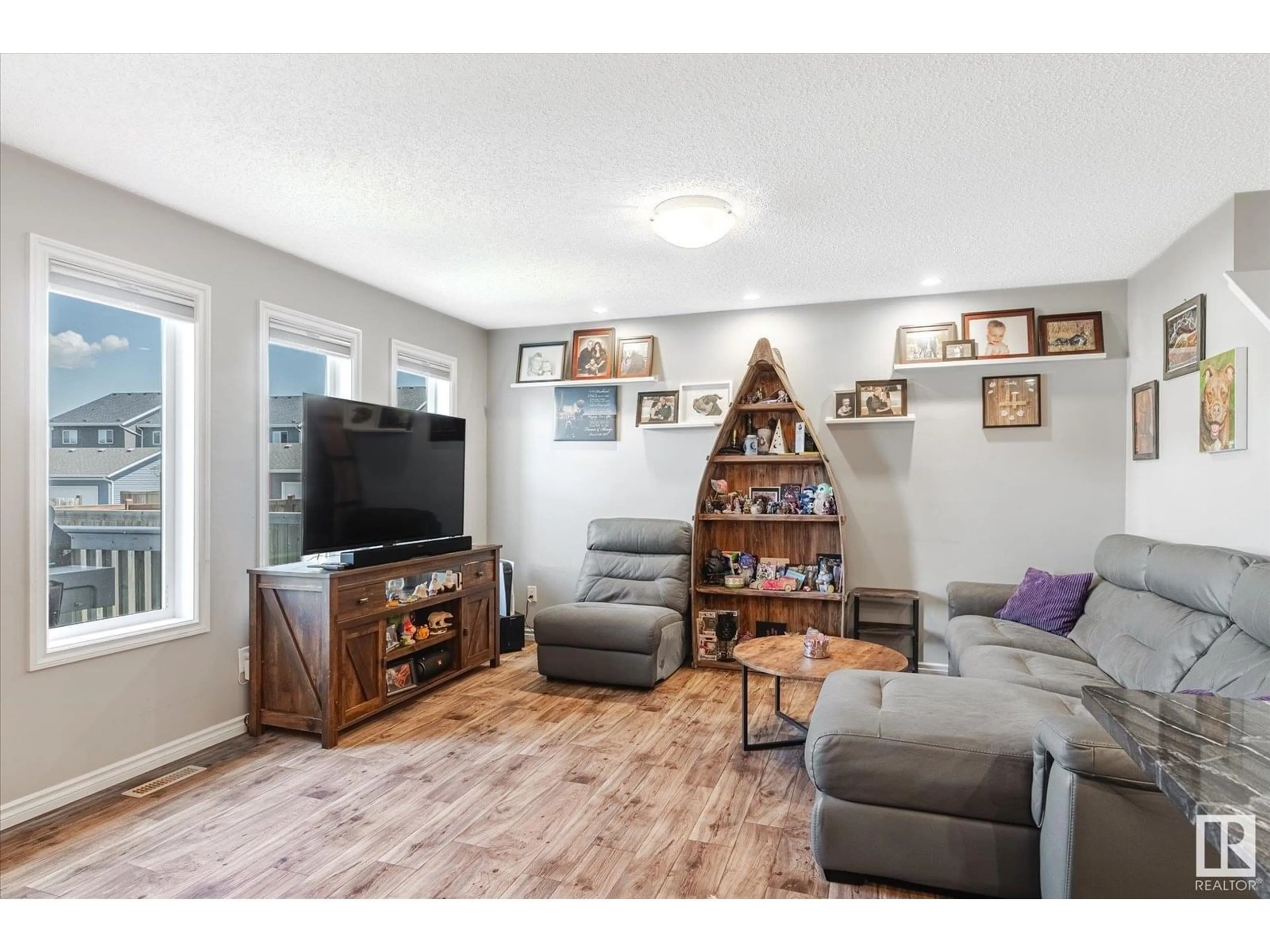 Living room with furniture, unknown for NW - 2424 19A AV, Edmonton Alberta T6T2C9