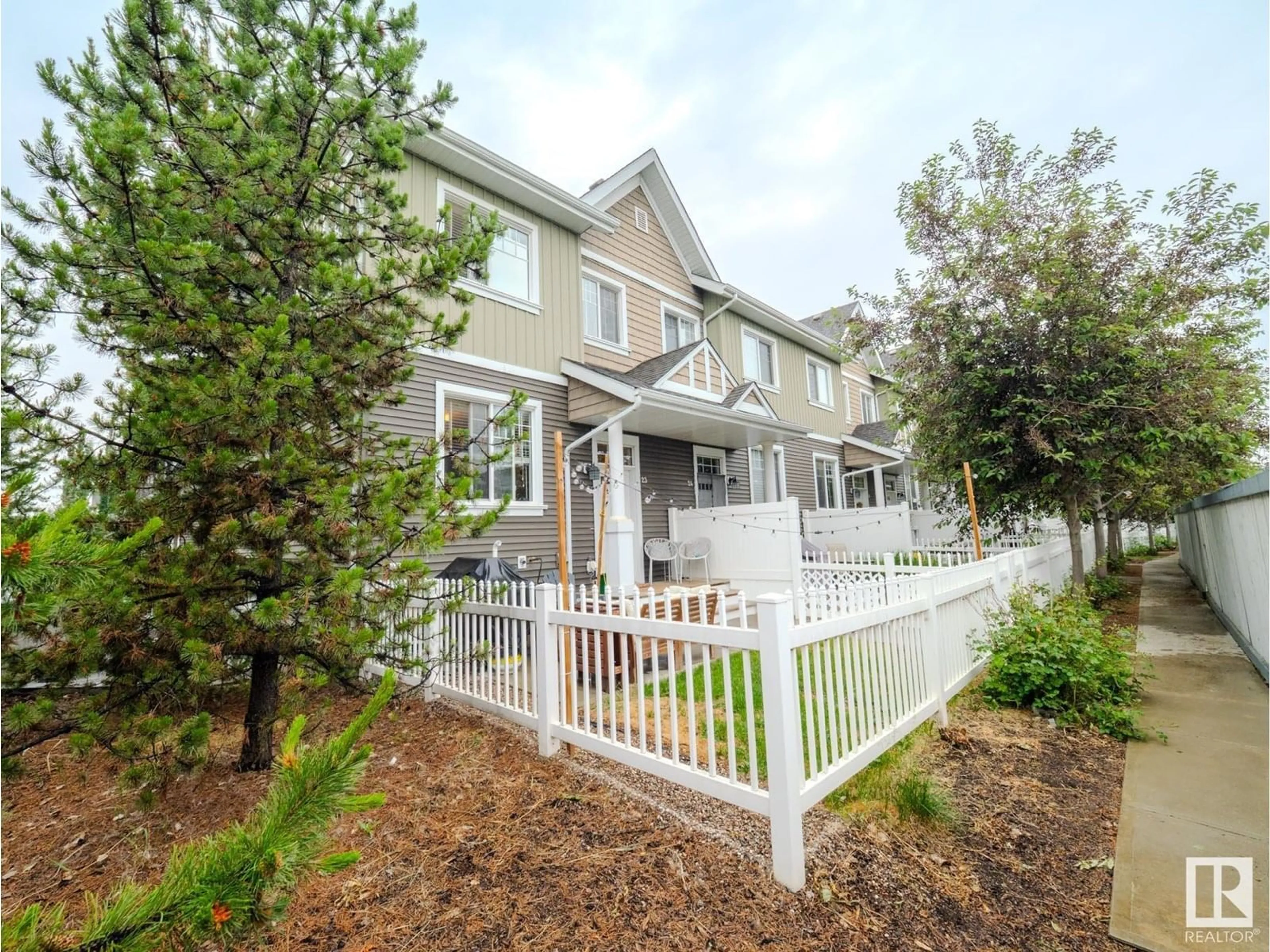 Home with vinyl exterior material, street for #23 - 4050 SAVARYN DR, Edmonton Alberta T6X1R8