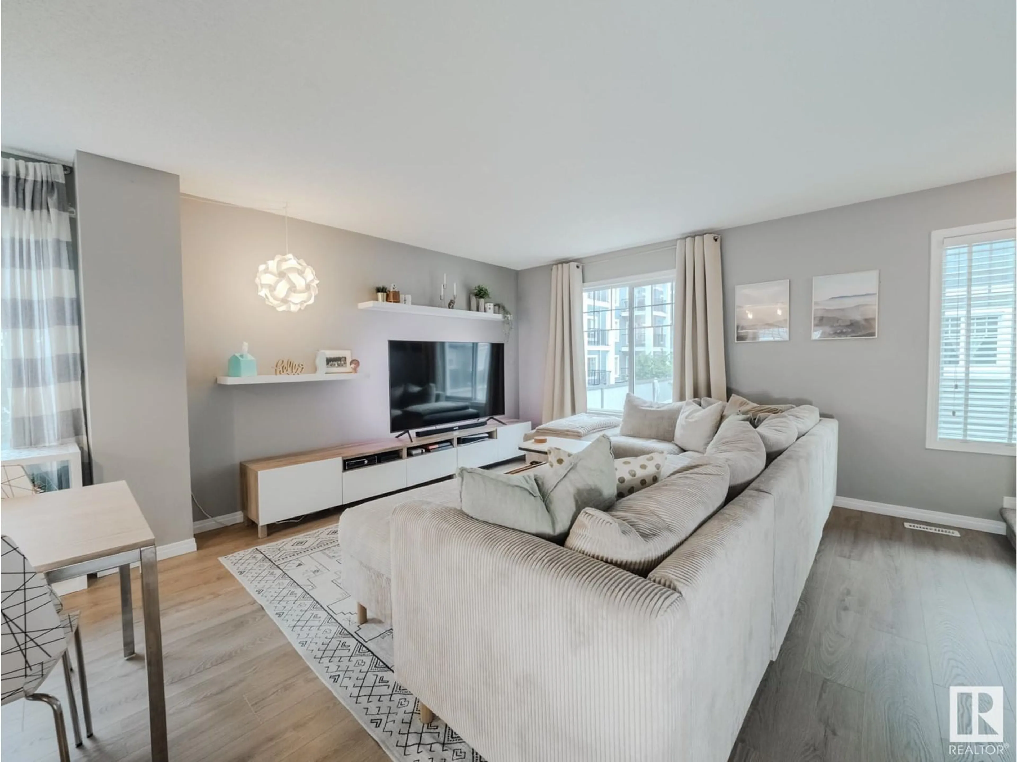 Living room with furniture, unknown for #23 - 4050 SAVARYN DR, Edmonton Alberta T6X1R8