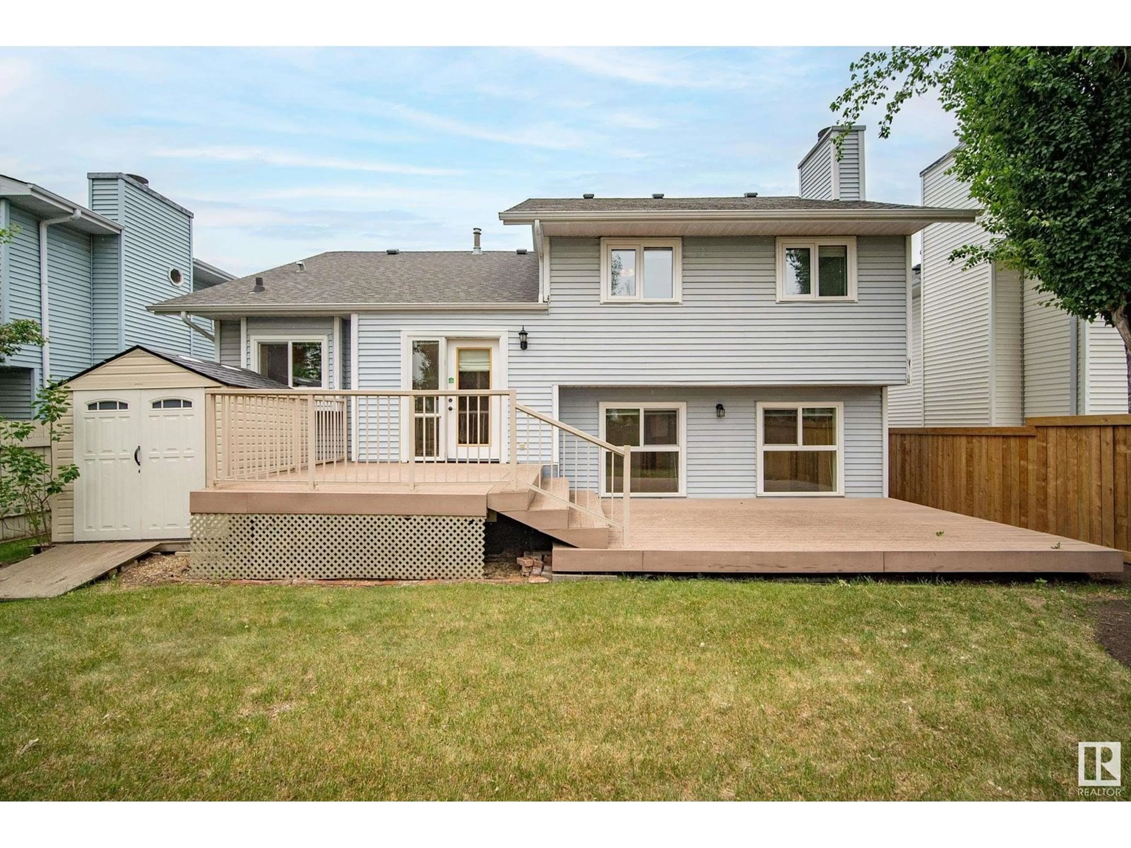 Home with vinyl exterior material, street for 148 WAYGOOD RD, Edmonton Alberta T5T5M1