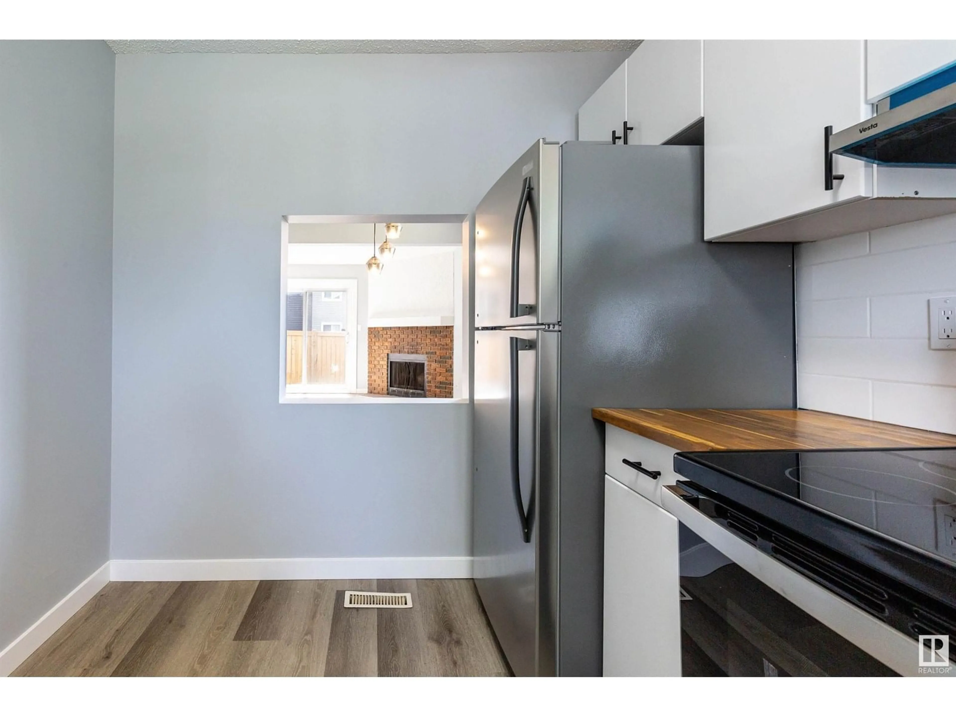 Standard kitchen, wood/laminate floor for 545 DUNLUCE RD, Edmonton Alberta T5X4P4