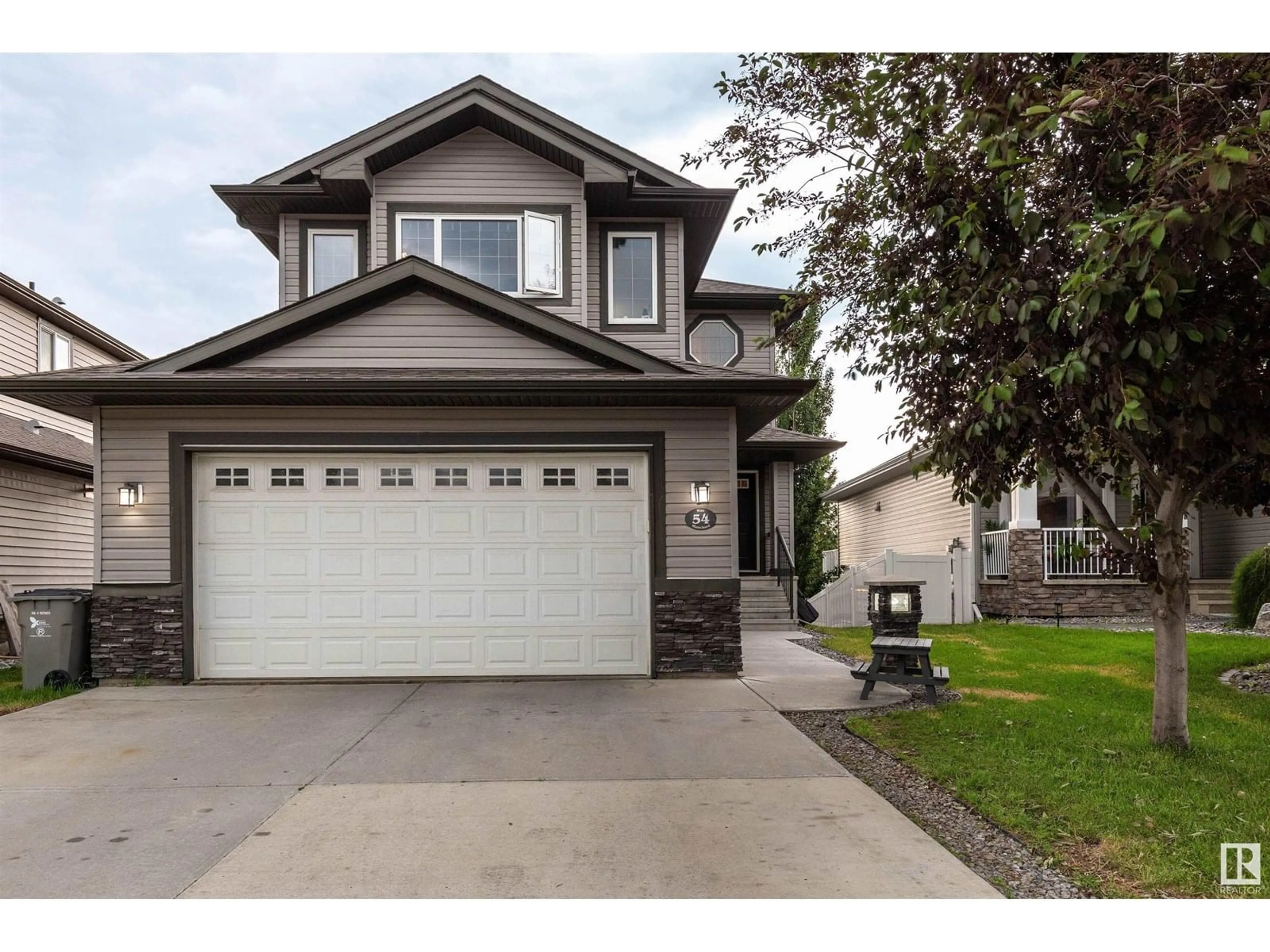 Home with vinyl exterior material, street for 54 RUE BLANCHARD, Beaumont Alberta T4X0E7
