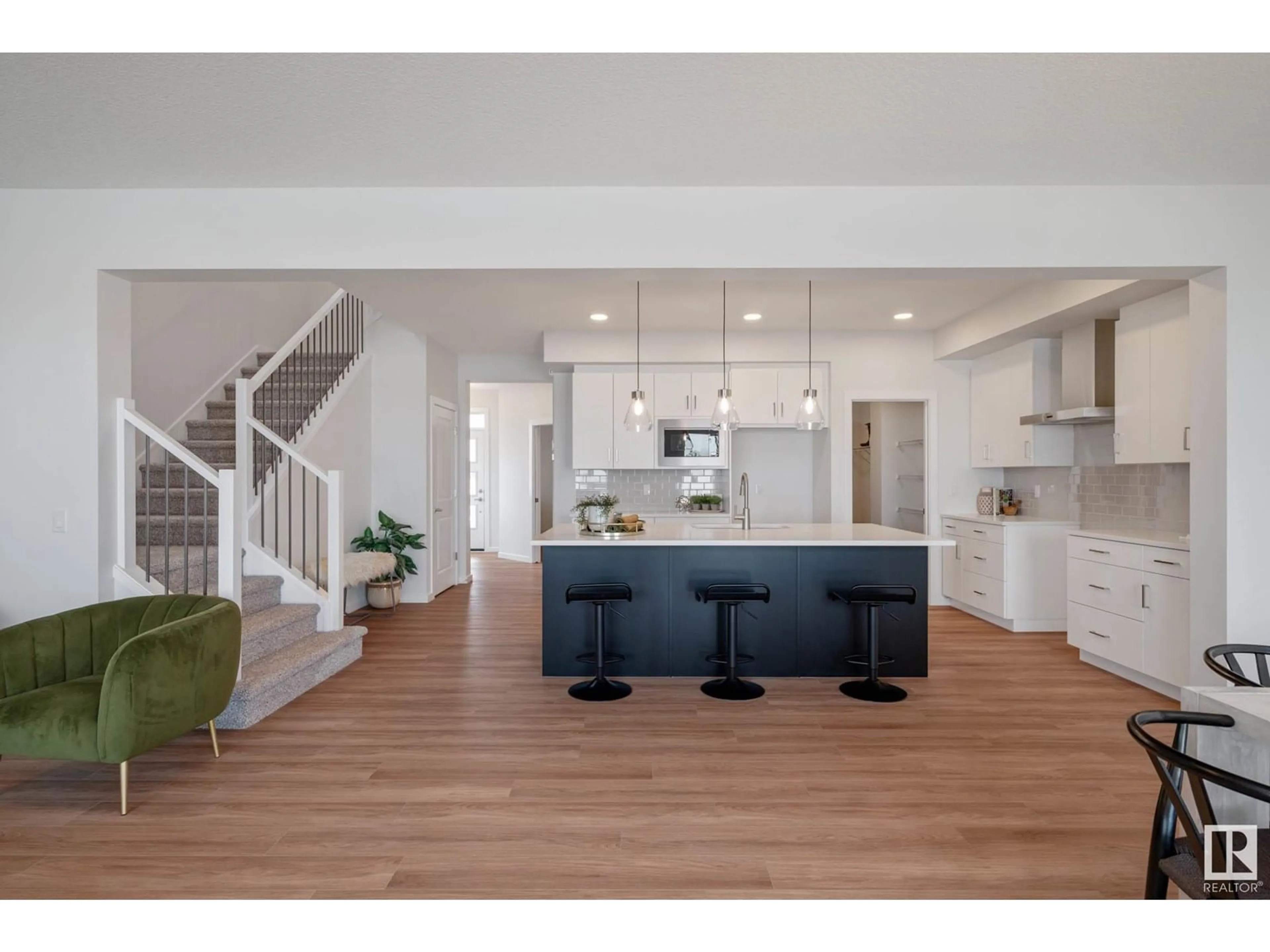 Open concept kitchen, wood/laminate floor for 303 STILES WY, Leduc Alberta X0X0X0
