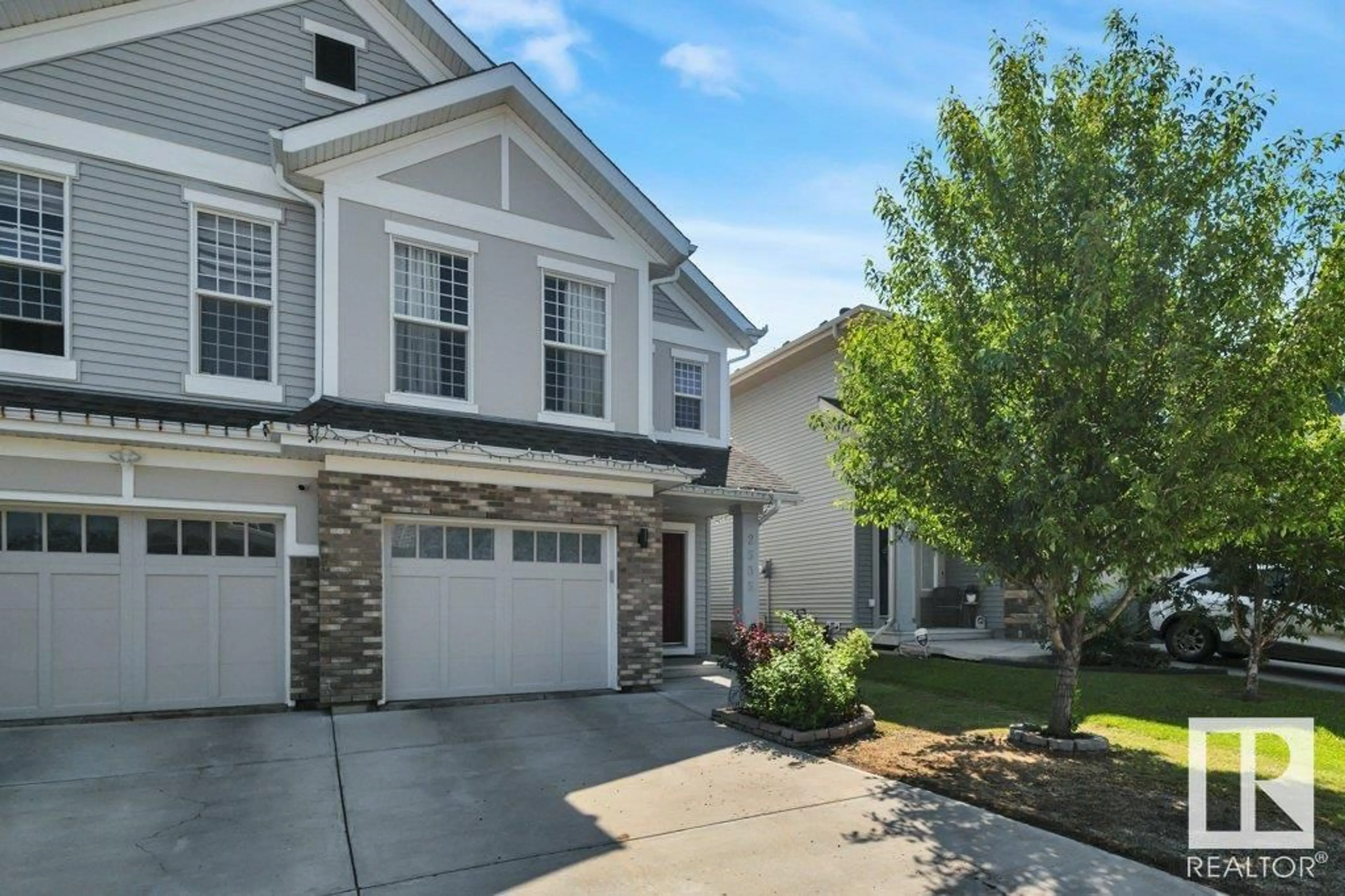 Home with vinyl exterior material, street for 2535 COUGHLAN RD, Edmonton Alberta T6W2X8