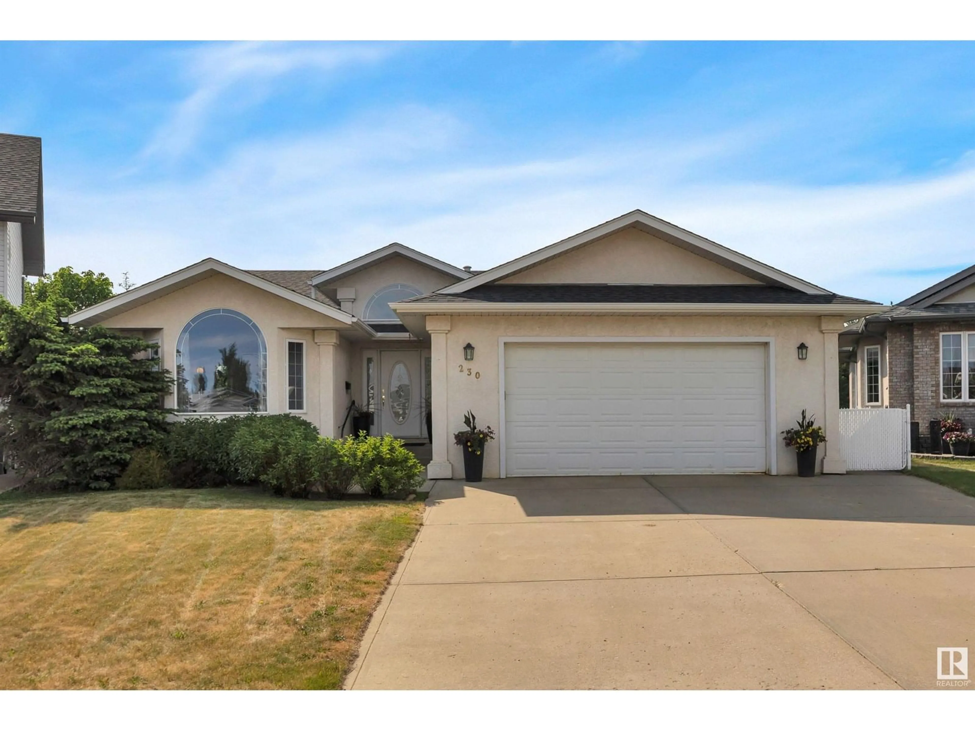 Home with vinyl exterior material, street for 230 PIPESTONE CL, Millet Alberta T0C1Z0