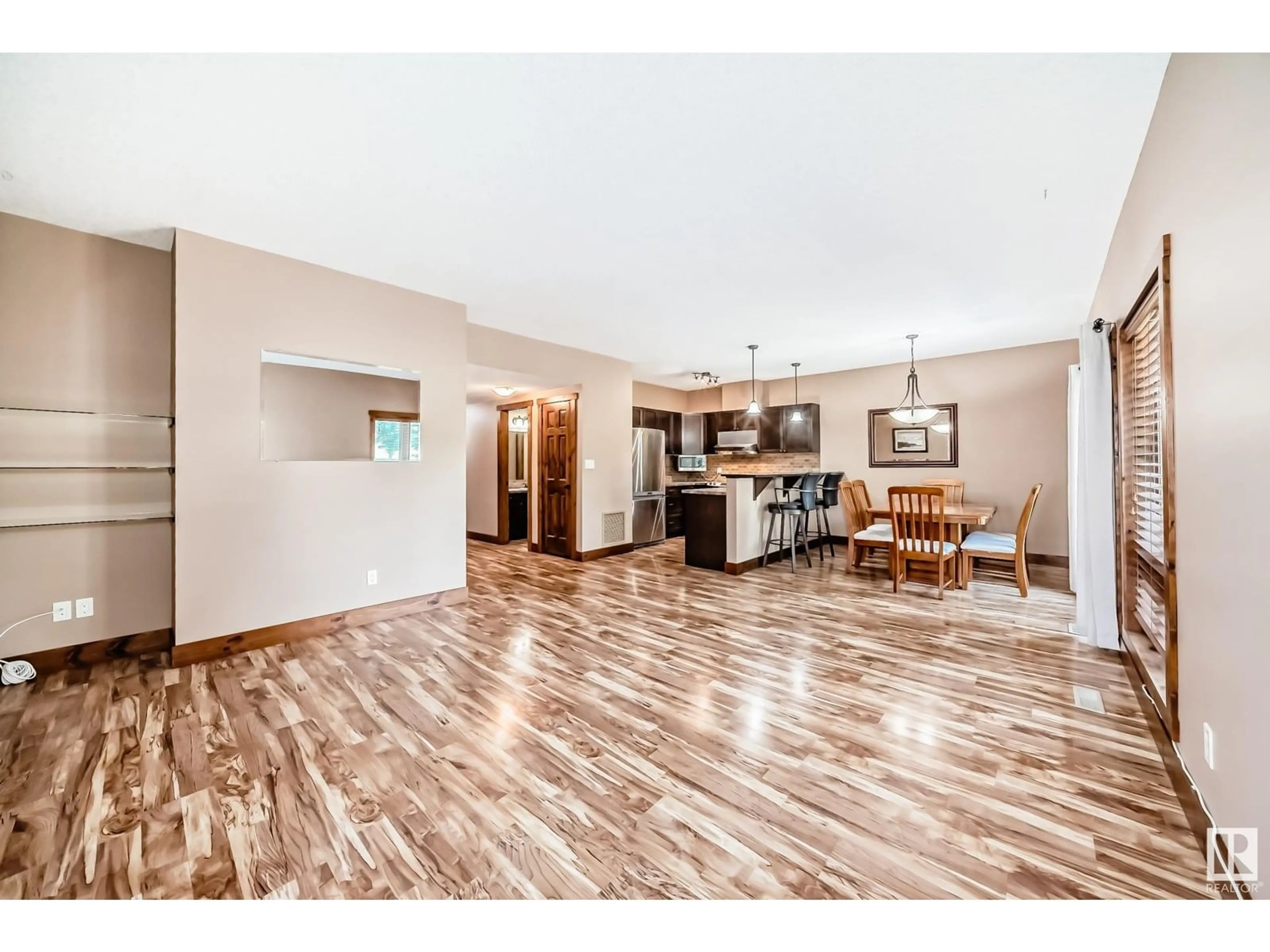 Open concept kitchen, wood/laminate floor for 801 GRAYBRIAR GR, Stony Plain Alberta T7X0G1