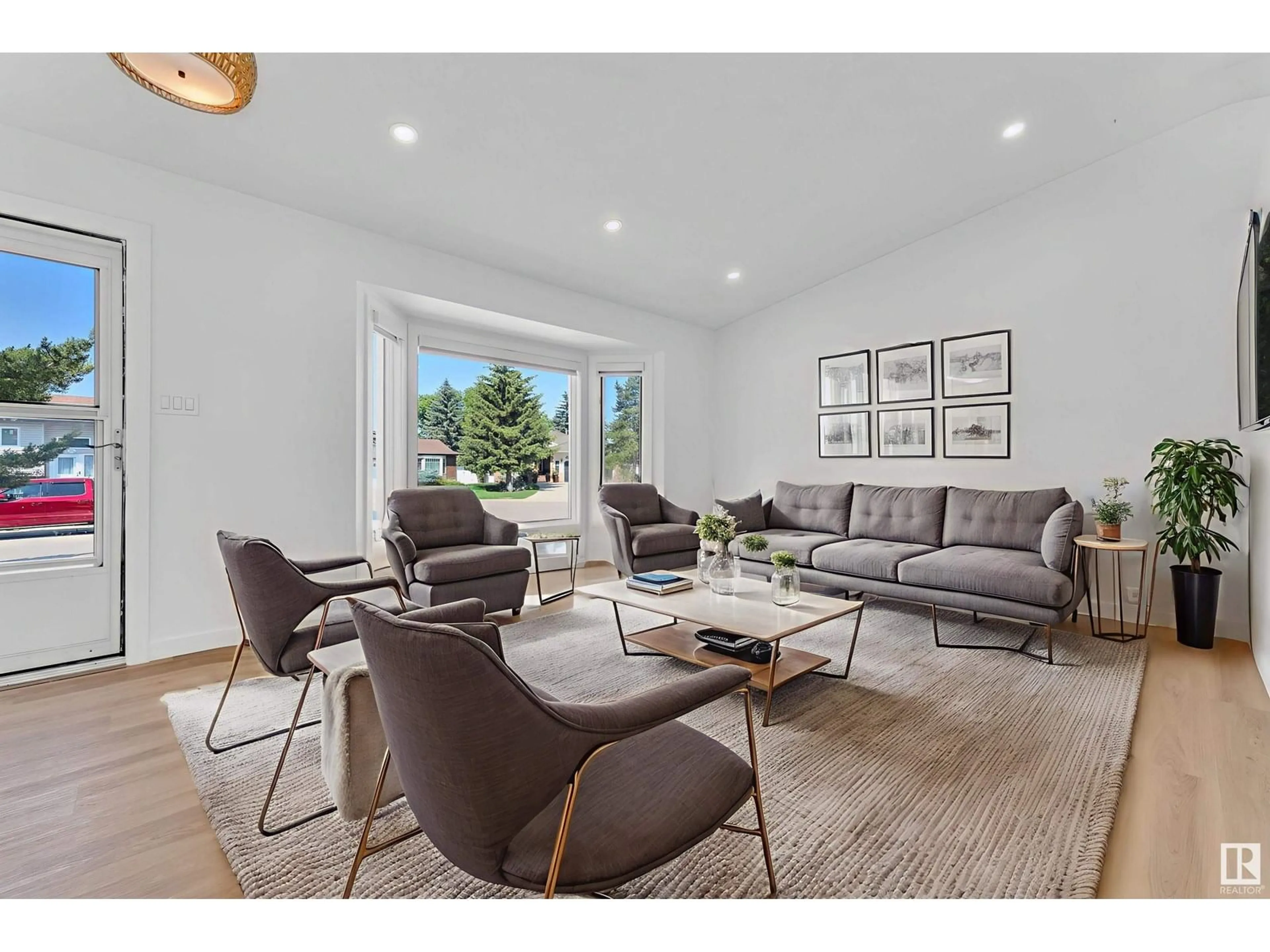 Living room with furniture, unknown for 4912 31 AV, Edmonton Alberta T6L5H6