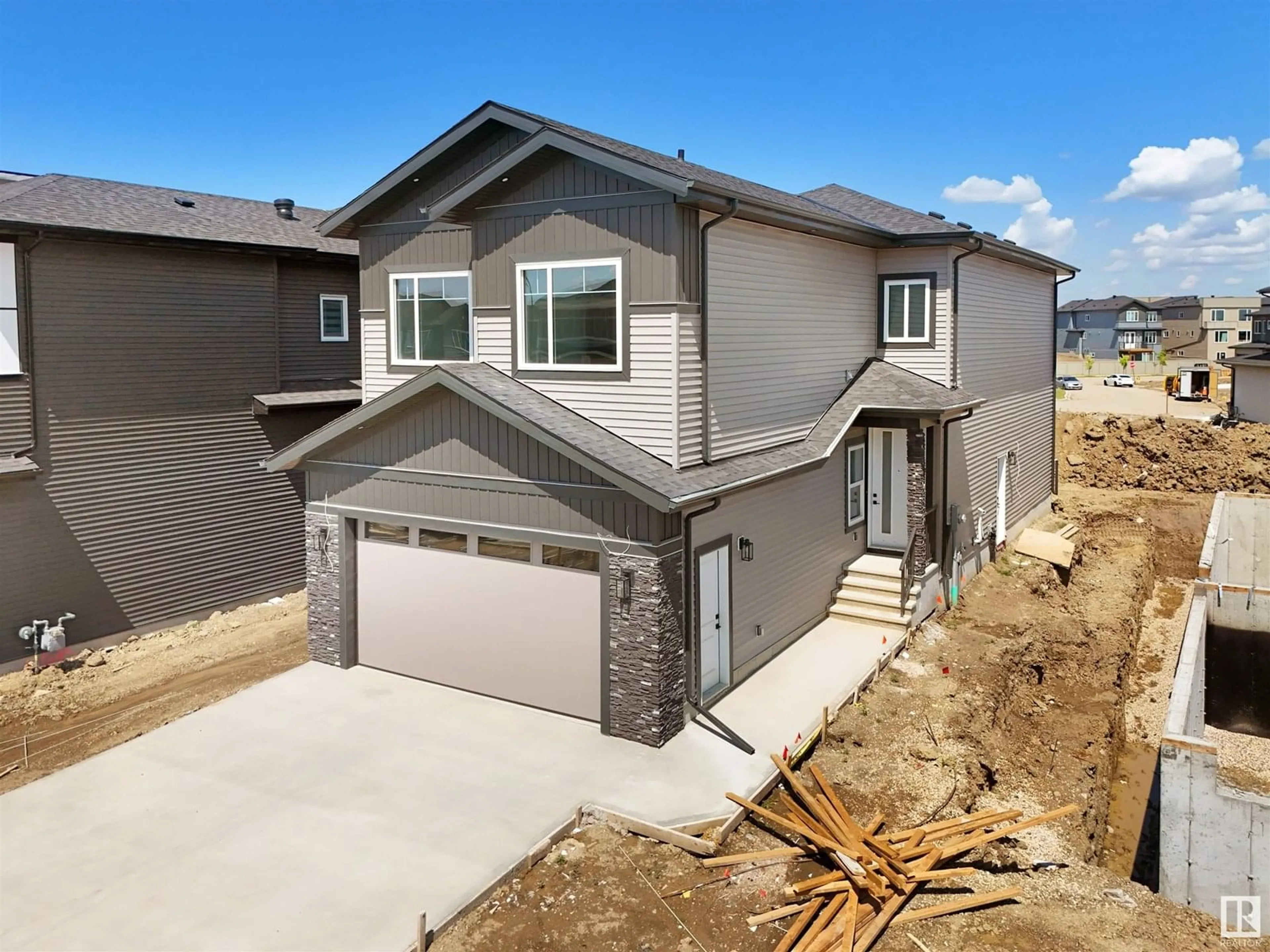 Home with brick exterior material, street for 1842 62 AVE NE, Rural Leduc County Alberta T4X3C8