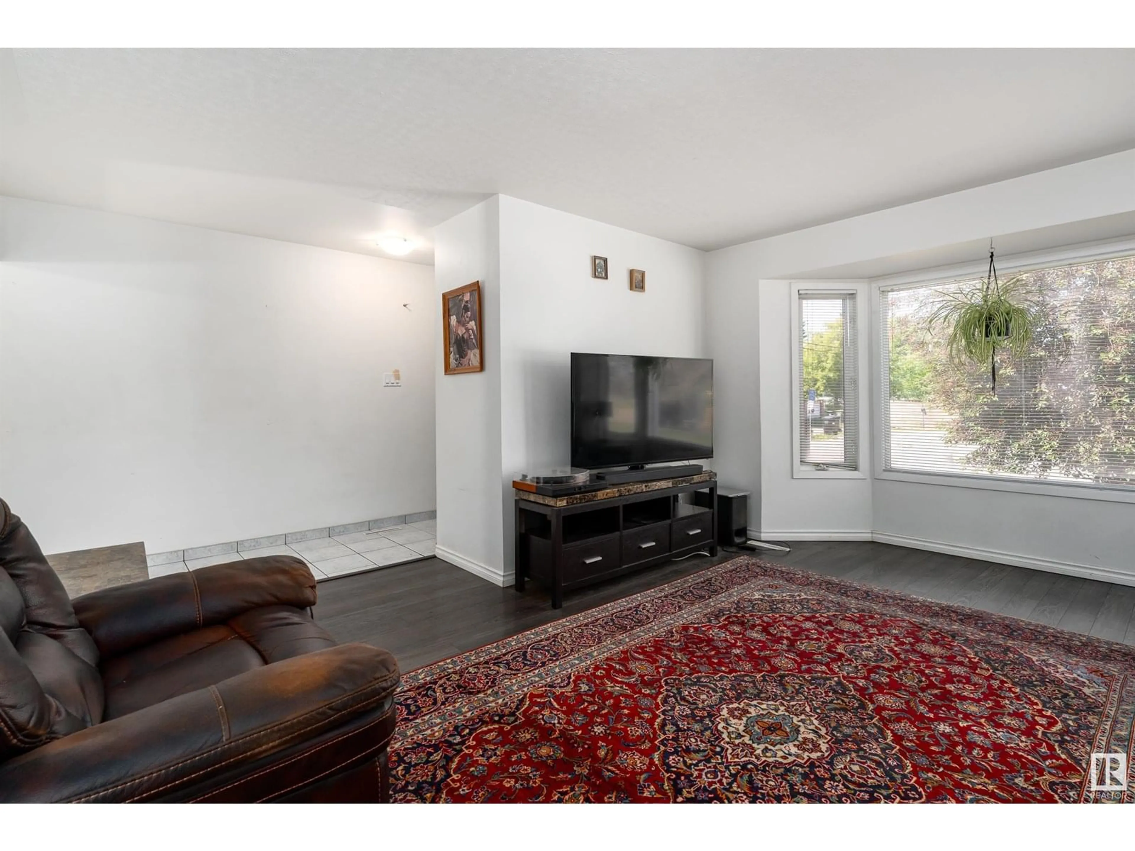 Living room with furniture, unknown for 4307 51 ST, Leduc Alberta T9E5B8