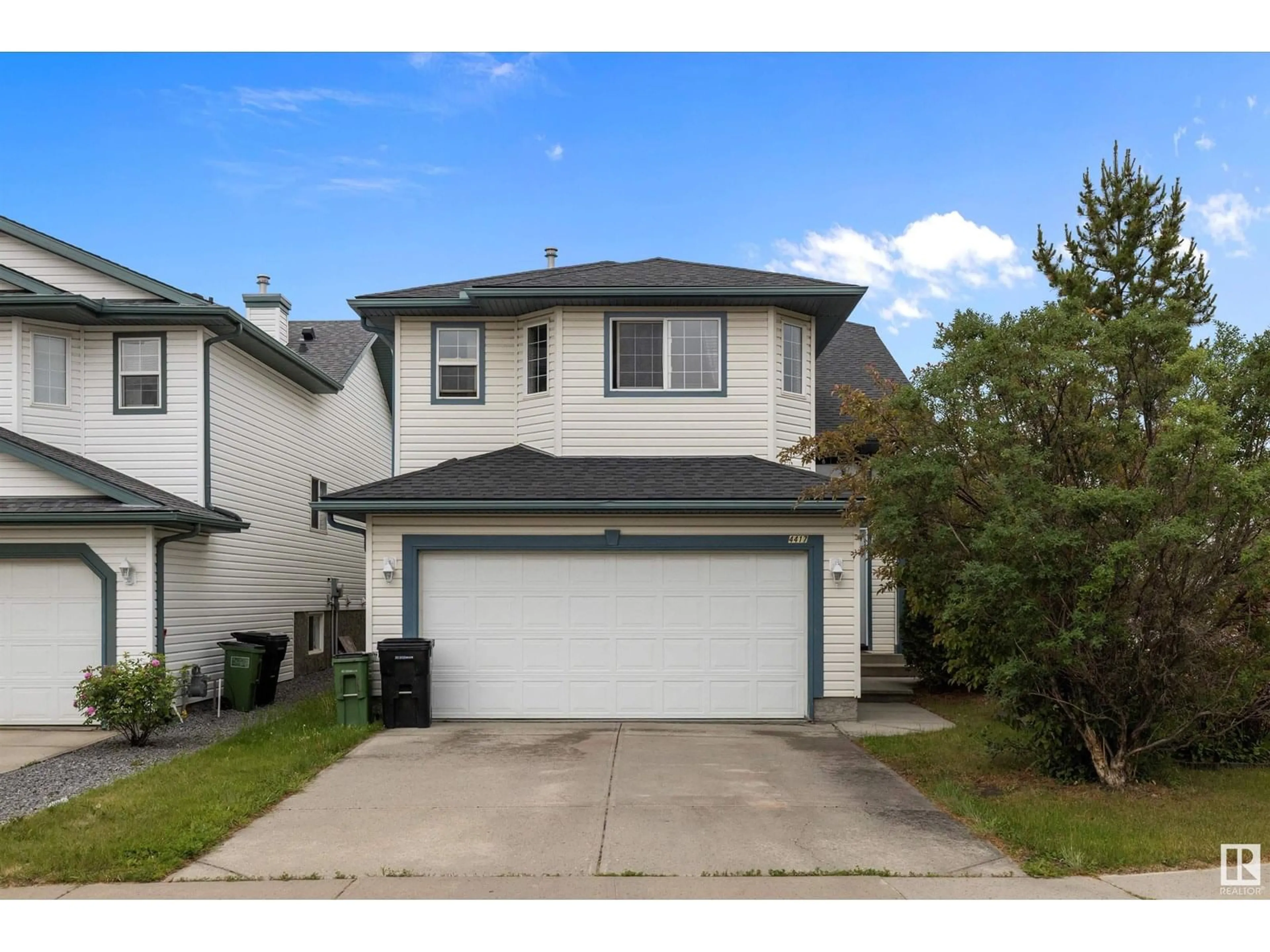 Home with vinyl exterior material, street for 4417 151A AV, Edmonton Alberta T5Y3B1