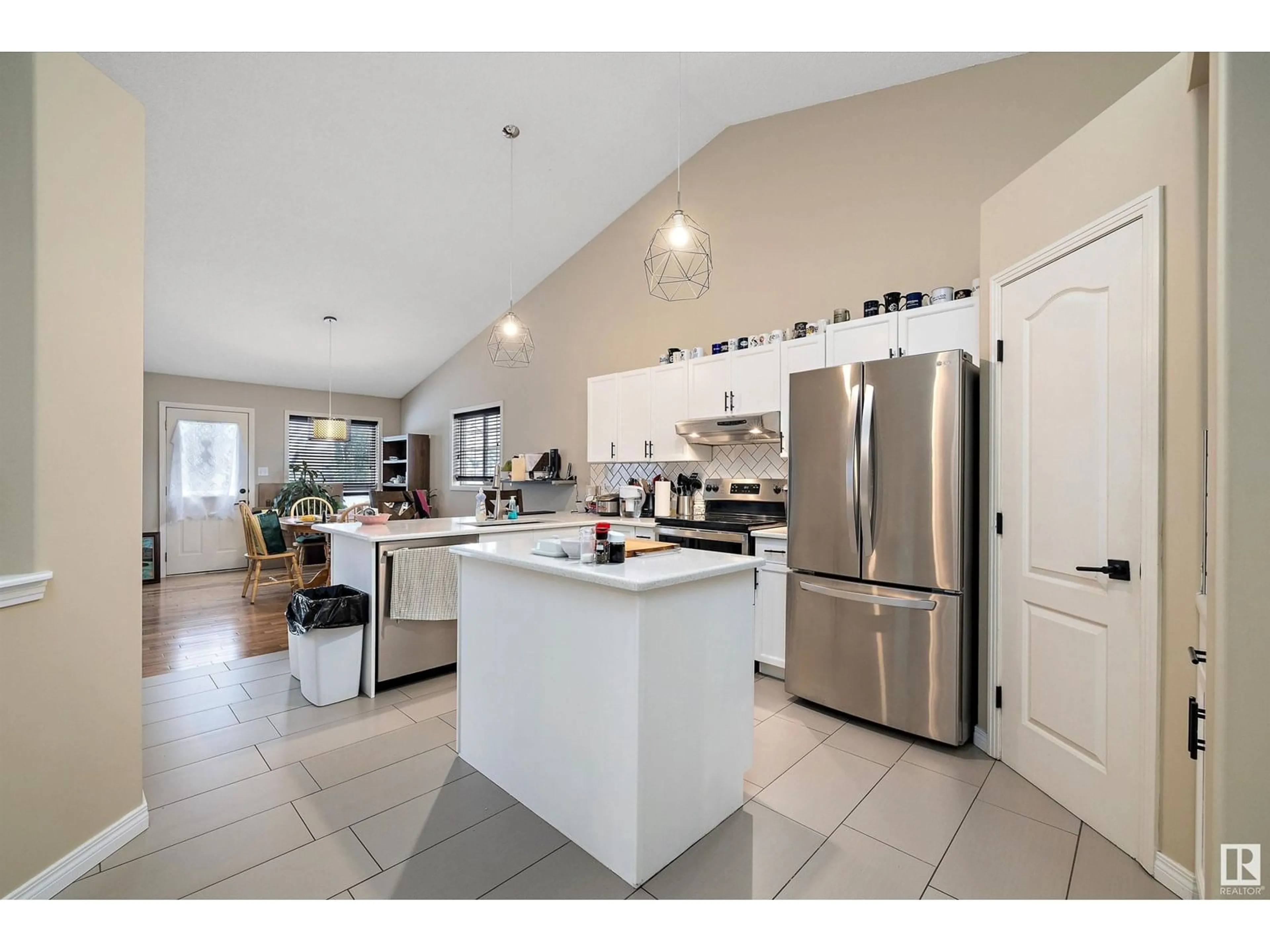 Open concept kitchen, ceramic/tile floor for 4417 151A AV, Edmonton Alberta T5Y3B1