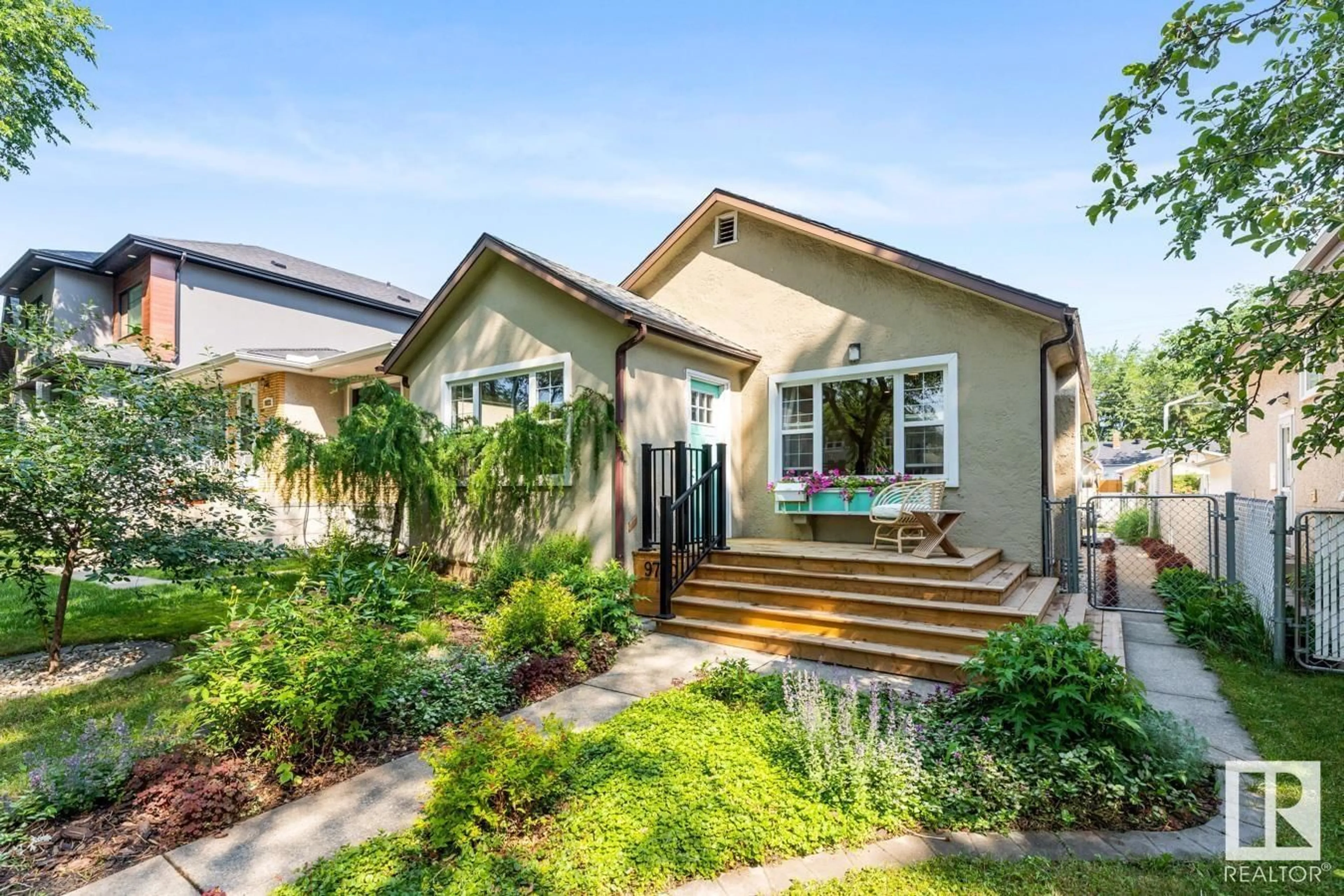 Home with vinyl exterior material, street for 9720 83 AV, Edmonton Alberta T6E2B5
