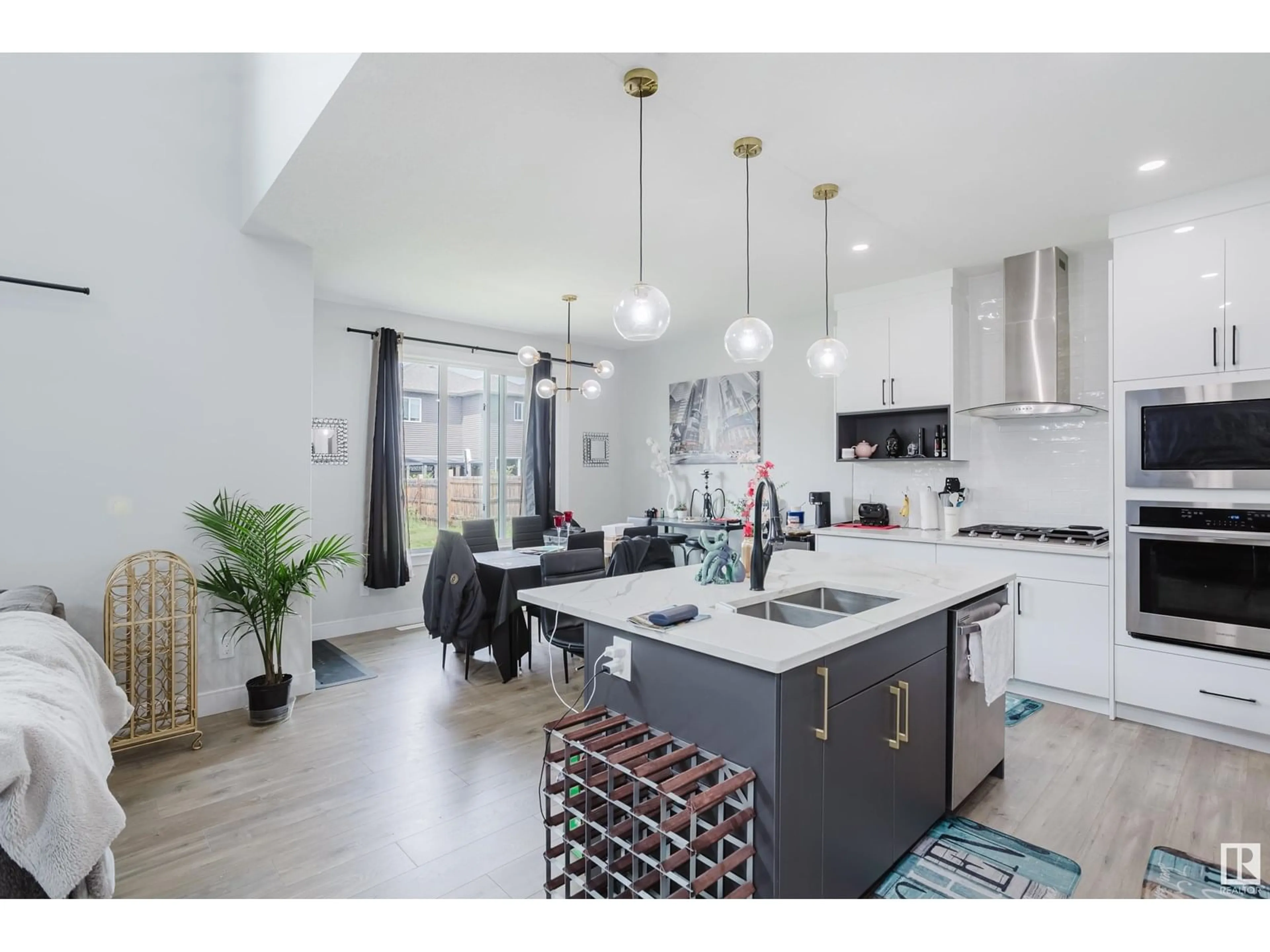 Open concept kitchen, ceramic/tile floor for 17328 68 ST, Edmonton Alberta T5Z0W4
