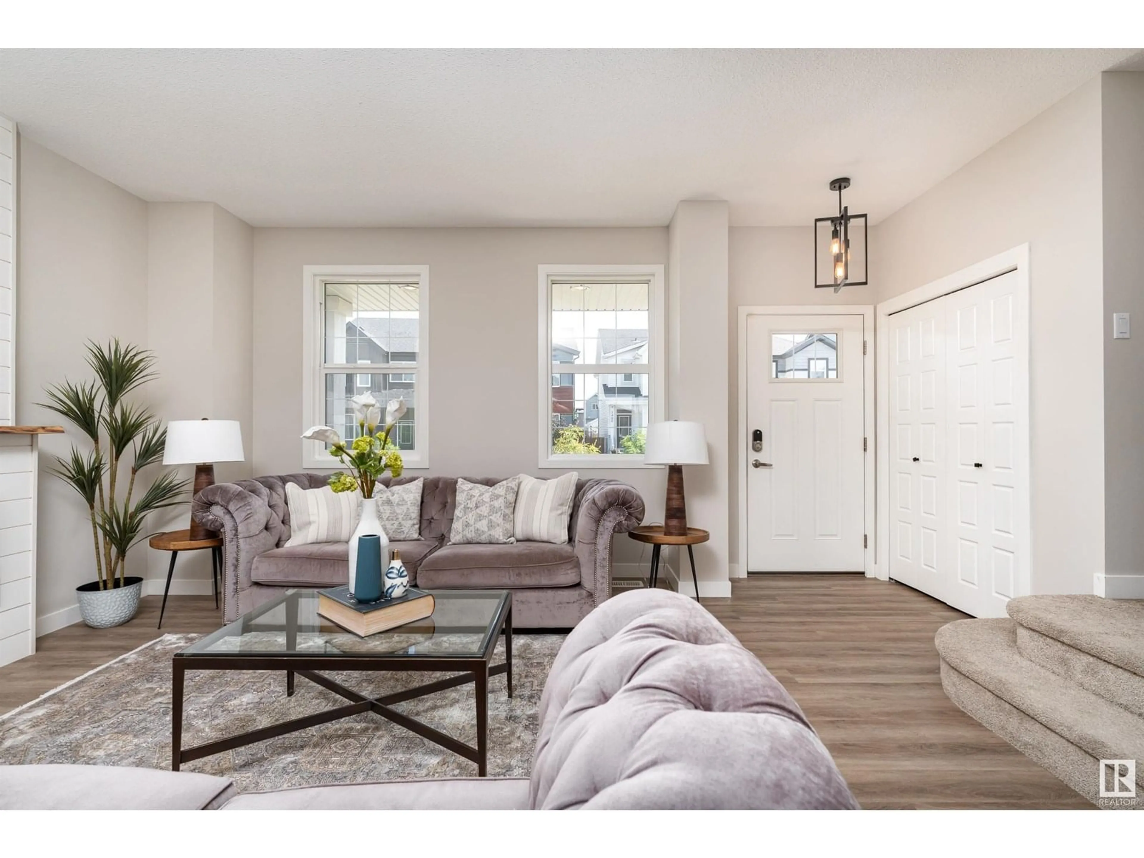 Living room with furniture, wood/laminate floor for 3404 ERLANGER BN, Edmonton Alberta T6M1J6