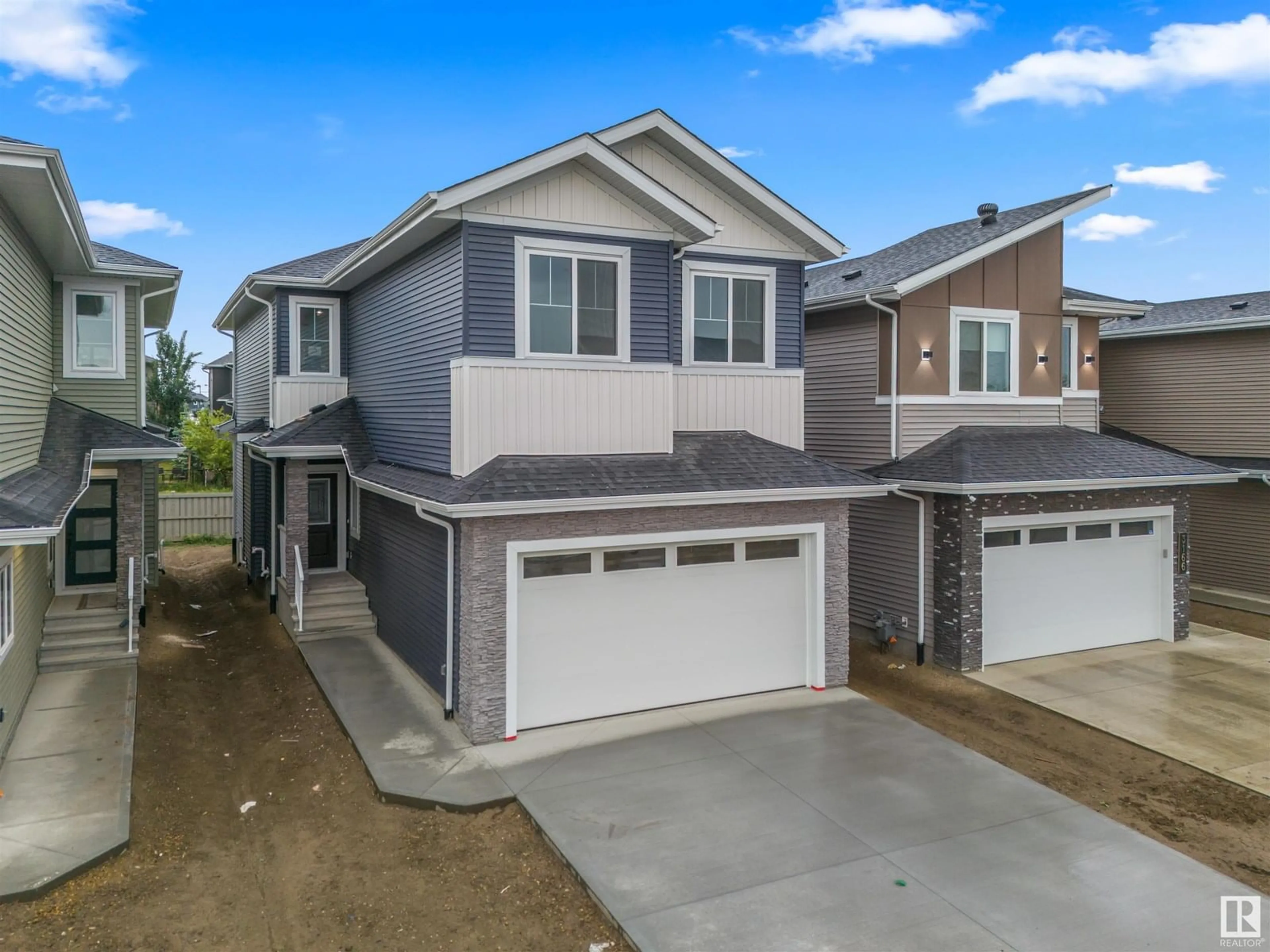 Home with vinyl exterior material, street for 3164 MAGPIE WY, Edmonton Alberta T5S0V4